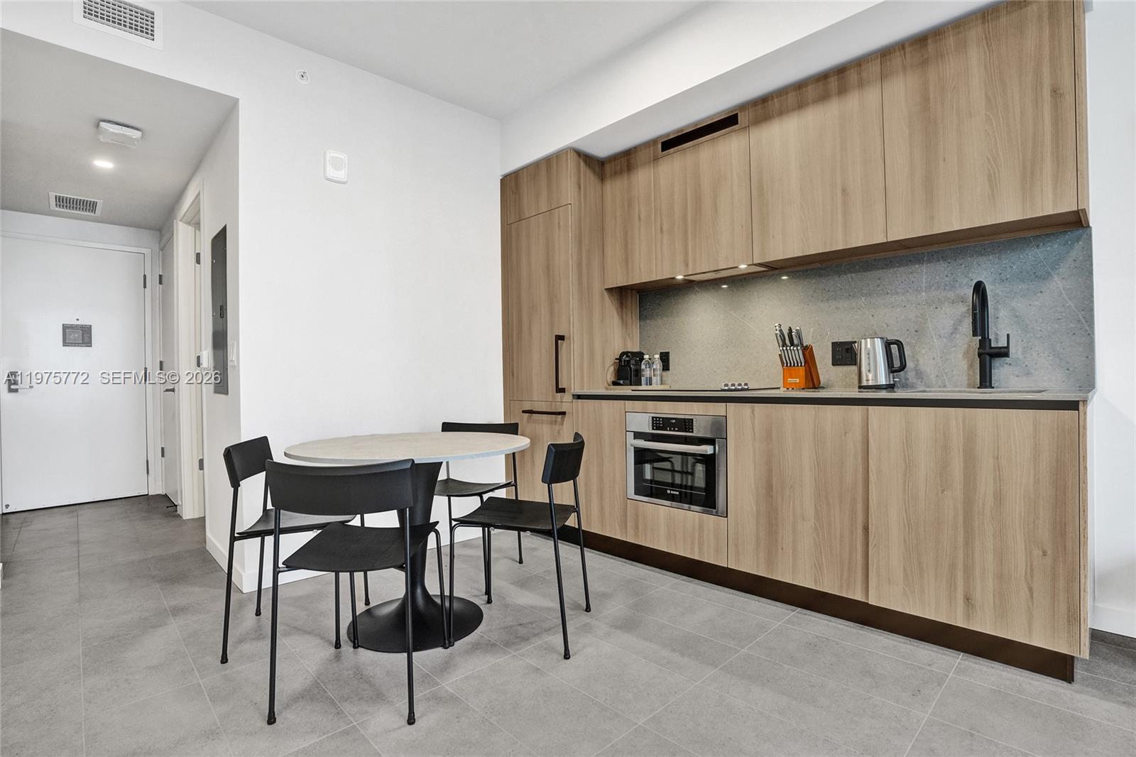 We just reduced the Price 55K for a quick sale, call your investors! Modern 1 Bed + Den condominium located in the heart of Downtown Miami, with exceptional views and prime positioning within the building. This unit is one of the few in the area featuring no rental restrictions, making it ideal for short-term or long-term rental income or personal use with maximum flexibility. Delivered fully furnished in a brand-new building, the residence has never been occupied, presenting a true turnkey opportunity for the next owner. Residents enjoy incredible, top-of-the-line amenities designed to elevate the lifestyle experience, including resort-style common areas and premium building features that support both comfort and strong rental demand. With the best location and one of the most desirable views in the building, the smart layout maximizes space and functionality. Situated steps from top dining, entertainment, shopping, and transit, this property represents a rare opportunity to own in a high-demand urban market with strong investment upside. Seller financing available.