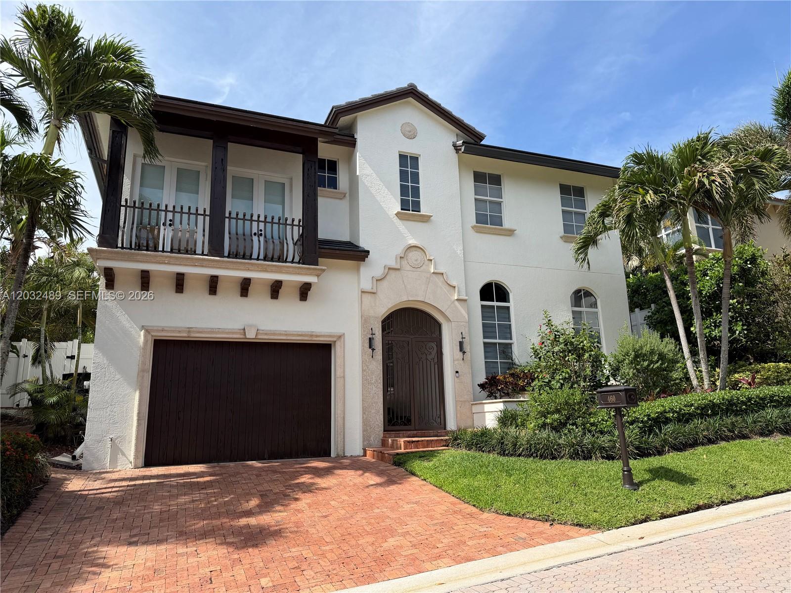 Ocean views and a less than a block to the beach! Behind its classic Mediteranean exterior, this exceptional home has been transformed with a fresh, contemporaty design that is both elegant and inviting. Clean lines, quality finishes and thoughtfully designed living spaces create a style that is far from the traditional heavy Mediterranean or typical coastal look. This home offers sophistication, charm and location. The tall windows brighten the interior with natural light. The private outdoor setting includes a sparkling pool surrounded by an authentic Chicago brick patio.. Enter through a charming covered entry leading to the house, the courtyard and the pool which creates a private outdoor retreat and the ocean breezes. Upstairs, all bedrooms are in-suite offering both privacy and comfort. The upstairs primary suite features a sitting area, and balcony showcasing ocean views. There is a den/office which could easily used as a 4th bedroom. A charming balcony overlooks the courtyard,pool and ocean. Completely renovated from top to bottom, including the roof, A/C systems, windows, new Downsview kitchen, top-or-the-line appliances, stone countertops, fresh paint, upgraded finishes, this home combines timeless architecture with modern living just steps from the beach. The attached 1.5  garage car provides extra storage for bikes, paddleboars, beach kyacks ,motor cycles ....Enjoy the balmy ocean breezes and beachfront lifestyle 365 days a year. Easy to see by appointment only.