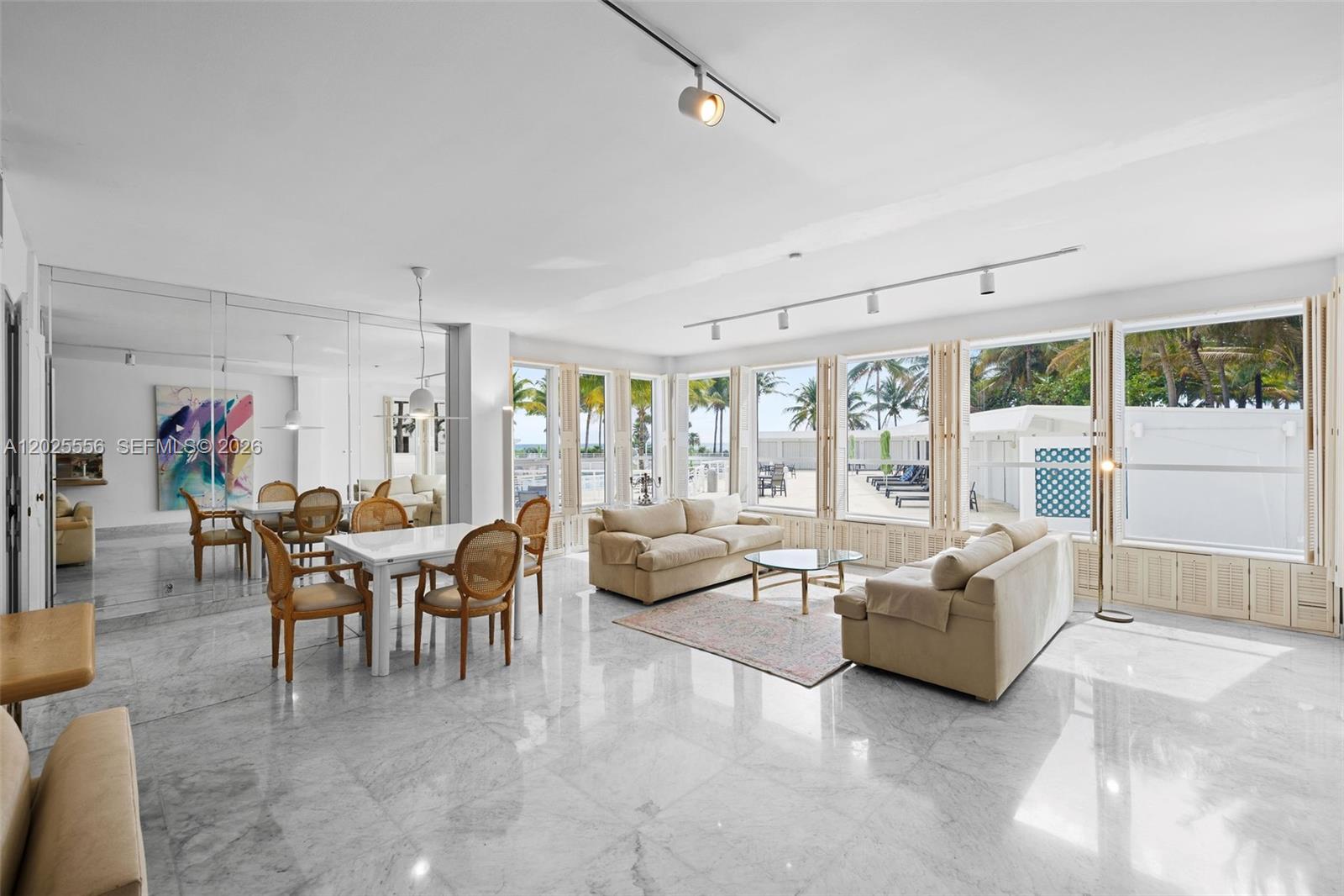 Bright and spacious first-floor walk-up residence with direct views of the pool, beach, and sunrise. Upon entry, you
are welcomed through a private foyer that leads into an oversized living and dining area with abundant natural
light throughout. This 2-bedroom, 2.5-bath unit also features a galley-style kitchen with a private exit leading
directly to the pool deck, perfect for easy indoor and outdoor living. The expansive primary suite overlooks the
pool and includes ample hallway closets, dual vanities, a separate glass-enclosed shower, and a soaking tub. The
generous secondary bedroom also offers a large space and a full bath with tub. Residents enjoy resort-style
amenities and direct beach access, making this a fantastic opportunity for effortless beachfront living.