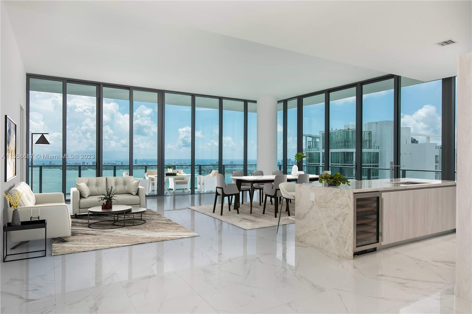One of a kind stunning PH with unobstructed ocean views. 4 beds and 4 1/2 baths with gorgeous floors, wraparound balcony facing east and west with a mini-Jacuzzi to enjoy the ocean views, closets by ItalKraft, electric blinds and blackouts, 4 parking spaces, 1 storage, private cellar, top of the line appliances and 12"ceilings. Gran Paraiso services available to residents outdoor park, Cabanas, Pool, BB-q Area, Tennis Courts, Lounges, Library, Wine Room, Game Room, Spa, Gym, Bowling, Theater. You are steps to Midtown, Design District, Downtown and only a bridge away from Miami Beach. Enjoy the unbelievable sunrises in Gran Paraiso.