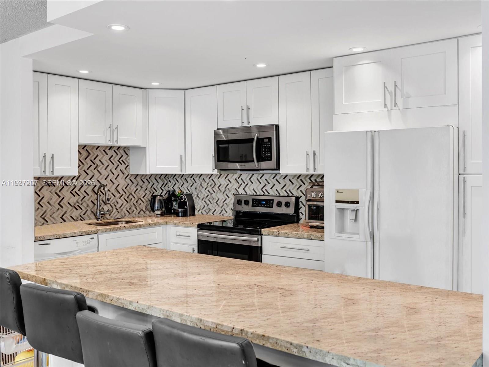 GREAT LOCATION in the heart of Aventura! Spacious 3 Beds/2 Baths unit in the desirable Villa Dorada community. This bright unit features a renovated kitchen w/granite countertops, in-unit washer & dryer, porcelain tile in the living areas, and laminate wood floors in the bedrooms. Enjoy a screened balcony, ample storage space, and 1 assigned parking spot. Villa Dorada offers amenities including two pools, fitness center, clubhouse, card room, BBQ area, and playground. Located along the Aventura Circle Exercise Trail and just steps from Aventura Mall, supermarkets, restaurants, parks, and more. Only minutes from the beach. Don't miss this opportunity!
