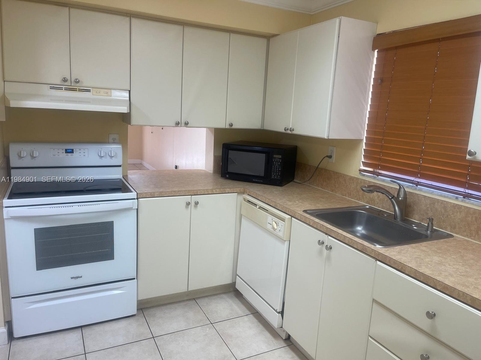 $10,000 Sellers credit to the buyers with full price offer at closing 
LOCATION! Don’t miss this beautifully maintained 2 bedroom, 2 story second floor unit located in the highly desirable Kendall area. This unique style home is similar to a townhouse, featuring two levels that offer added privacy and a spacious layout. The first floor includes a well appointed kitchen, living room, and dining area, along with an in-unit washer and dryer for your convenience. Enjoy relaxing in the living room with a peaceful view of the community pool, creating the perfect setting to unwind. This home is located in a secure gated community featuring a newly renovated pool, playground, ample guest parking, and two assigned parking spaces. Water is included, and the community is both pet friendly and rental friendly, making it ideal for homeowners and investors alike. Conveniently located near top rated schools, parks, restaurants, shopping centers, major highways, and public transportation. This is a fantastic opportunity to own in one of Kendall’s most sought after locations.