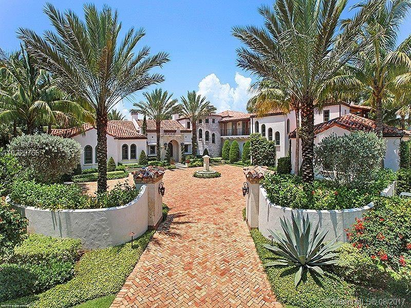 Cascading waterfalls accentuate refreshing lagoon ponds that flow beneath the private bridged entrance to this majestic Jupiter Island estate.  Travel through 2.7+/- acres of delightful tropical grounds that lead to the stately, 2-story Mediterranean-inpired main house, designed by noted architect Roger Janssen.  The property's exquisite landscaping is matched by an unparalleled, panoramic view of the Intracoastal Waterway.  Encompassing over 457 feet of protected water frontage, presenting a unique perspective of its natural surroundings.
