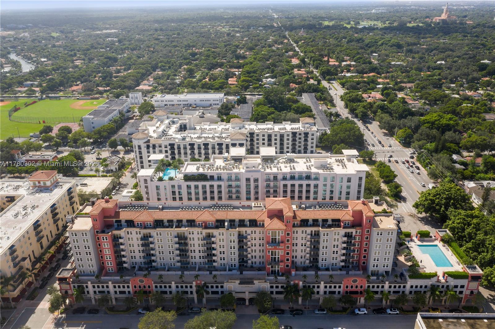 Located next to Merrick Park, just a short walk to shops and restaurants. This is perfect Urban living. Large 2-bedroom condo with wood floors throughout, large closets, washer and dryer and a large private terrace. Building amenities include a front desk attendant, gym, pool and meeting room. Take the free trolley to downtown Coral Gables, or the metro rail to Brickell, Downtown Miami, University of Miami or the airport