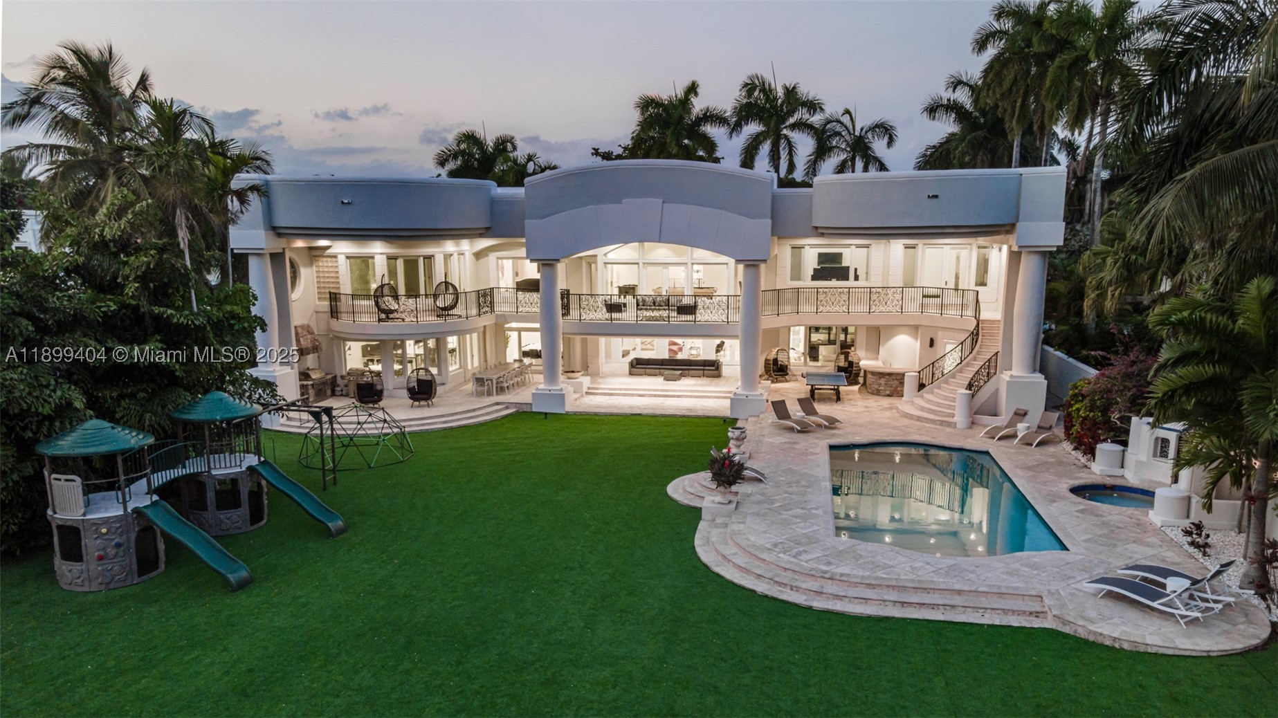 Experience one of the most extraordinary waterfront estates in all of Hollywood Lakes. Positioned on over half an acre along prestigious North Southlake, this rare point of land offers unmatched privacy, massive grounds, and breathtaking wide-water Intracoastal views from nearly every room in the home.

Spanning over 7,000 sq ft, this 8-bedroom, 6.5-bath residence is designed for both grand entertaining and elevated everyday living. From the moment you enter, soaring ceilings, expansive glass, and marble floors frame endless water vistas that feel truly world-class.

The outdoor space is what sets this property apart—a sprawling backyard rarely found on the Intracoastal, complete with resort-style pool, spa cabana, and multiple covered terraces, all surrounded by lush privacy and open sky. Whether hosting large gatherings or enjoying quiet sunsets, the setting is simply unmatched.

For boating enthusiasts, enjoy direct ocean access with no fixed bridges, a 100-foot seawall, and a 50-foot private dock—perfect for large vessels and effortless days on the water.

Additional highlights include a gourmet chef’s kitchen, custom bar, expansive living areas, and multiple balconies capturing sunrise-to-sunset views.

This is more than a home—it’s a private waterfront compound, offering scale, views, and land that are nearly impossible to replicate in South Florida.