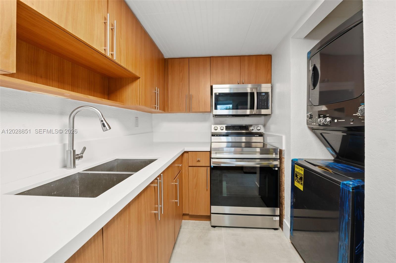 Discover this inviting two-bedroom, two-bathroom condominium in Hialeah Gardens, featuring tile floors throughout, impact windows and doors, and an in-unit washer and dryer. The appliances are just a year old, offering added peace of mind. Conveniently located with easy access to the Palmetto Expressway, shopping, dining, and everyday conveniences. Schedule your showing today!