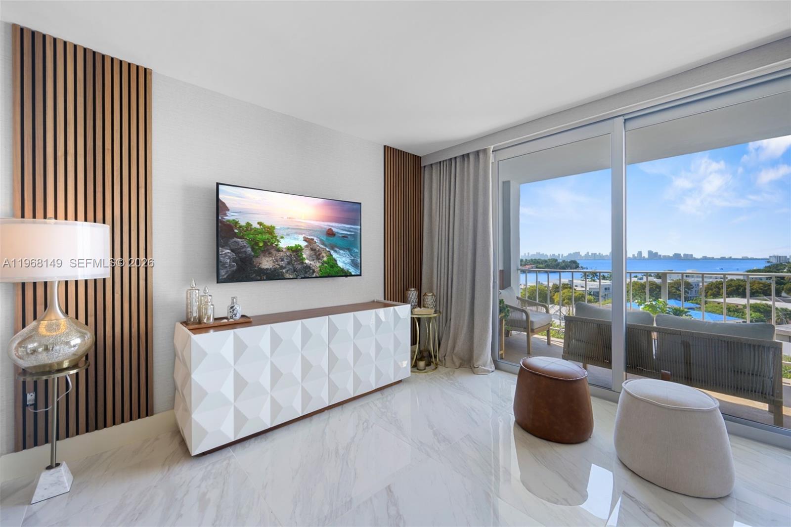 Just Reduced ! Beautifully renovated and fully furnished 1-bedroom, 1.5-bath apartment located in Miami Beach. This residence offers stunning bay and water views, filling the home with natural light and an open, elegant feel. The apartment has been professionally designed and renovated with great attention to detail. The living and dining area is bright and inviting, finished with tasteful materials and a layout that enhances both comfort and the surrounding views. The kitchen features custom cabinetry, top-of-the-line appliances, and a sleek, modern look that blends style with everyday functionality. The primary bedroom is spacious and comfortable, offering generous closet space. Both the full bathroom and the guest powder room have been fully renovated with quality materials and a refined, modern style. Offered fully furnished and turnkey, this is an exceptional opportunity to own a move-in-ready residence in a desirable Miami Beach location with beautiful water views.