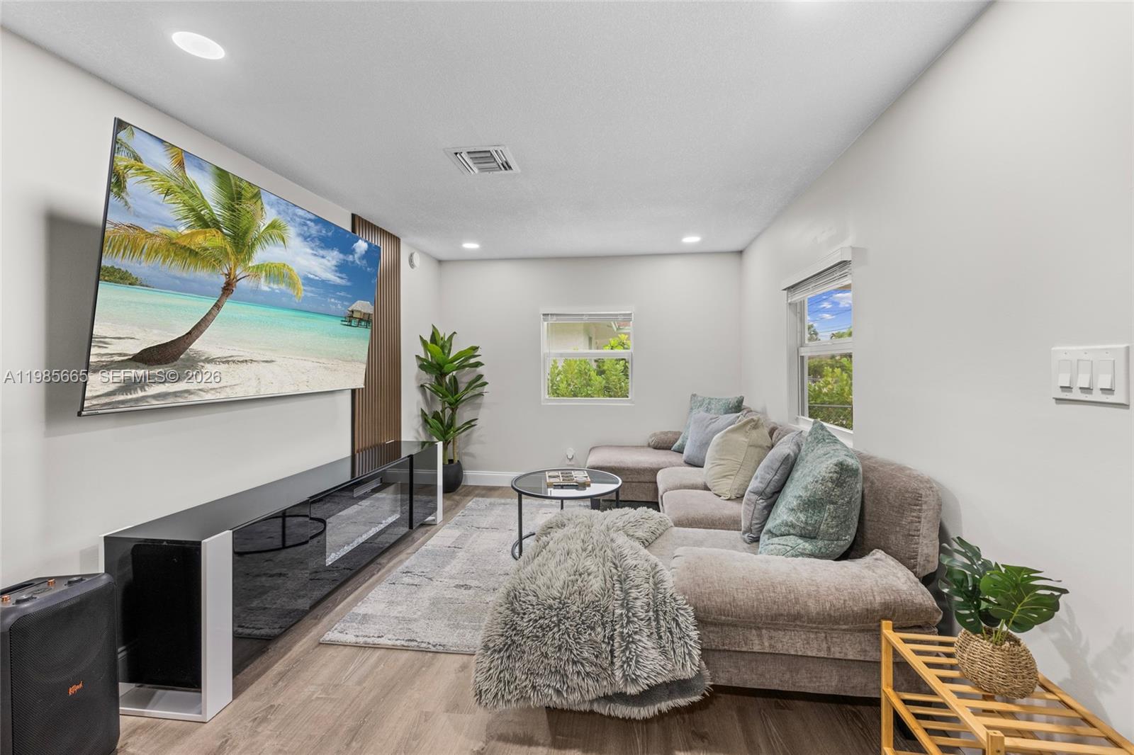 Beautifully updated 3-bedroom, 2-bath single-family home in Jupiter featuring a large private yard with putting green, spa, and outdoor lounge space. Bright open layout, modern finishes, and move-in ready. Prime location minutes from beaches, parks, restaurants, and shopping. Available furnished or unfurnished.