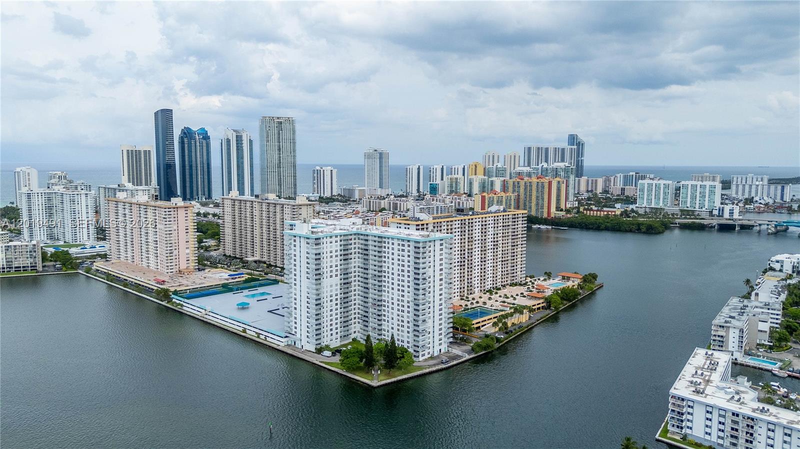 Experience luxury living in this unique and oversized 3-bedroom, 3-bathroom corner residence in Sunny Isles Beach, showcasing breathtaking Intracoastal and partial ocean views from every room. Bright and elegant with north, west, and south exposures, the home features a large wraparound balcony perfect for relaxing or entertaining while enjoying sunrise-to-sunset views. Set in a beautifully updated building with a new roof, modern lobby, renovated pool deck, and upgraded elevators, all just minutes from the beach, fine dining, shopping, and everyday conveniences. A rare opportunity to own refined coastal luxury in a prime location.