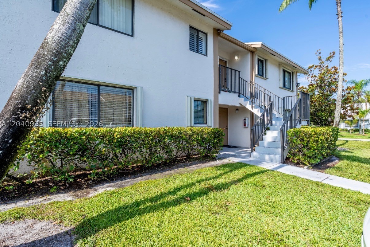 Renovated split floor plan condo with an approved budget and no current assessments. Financing friendly community with low down payment options available for qualified buyers. Features accordion shutters for added storm protection and potential insurance benefits, newer appliances, newer washer and dryer, walk-in closet, private patio, and storage area. Move-in ready and meticulously maintained.