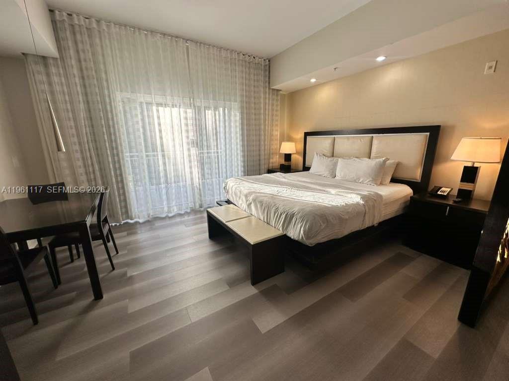 Beautiful condo-hotel unit located at The Blue, A Resort Hotel. This unit offers resort-style living with access to premium amenities including pool, fitness center, spa services, on-site dining, and concierge services. Ideal for investors or owners seeking a flexible use property. Conveniently located near major highways, shopping, dining, and golf courses. Excellent rental program potential.