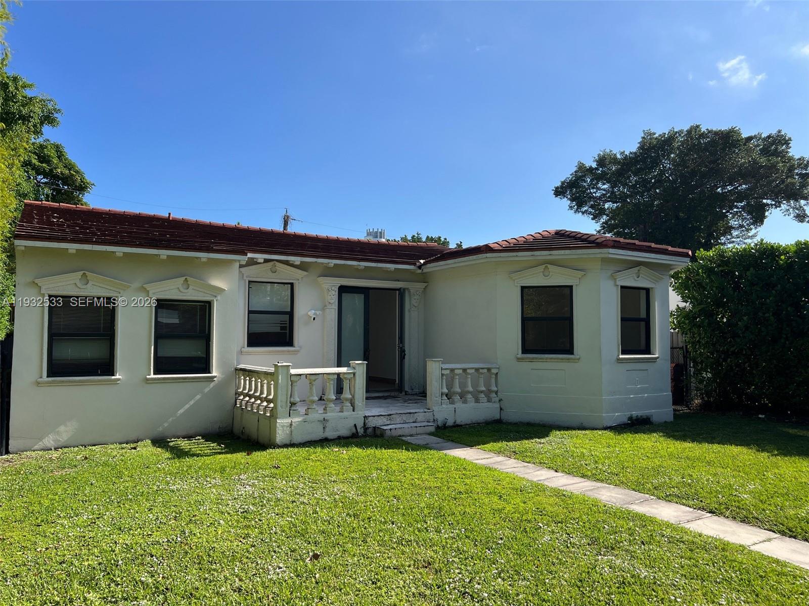 MUST SELL. Best Deal in Miami Beach. Freshly painted. Ready to move-in! All living spaces on a single ground-level floor. Beautiful Pool home. Baroque Details. Spacious, elegant, lots of natural light, this property offers unparalleled lifestyle and luxury living in one of Florida's most desirable neighborhoods in Mid Beach, near the La Gorce Country Club & Golf Course, walking distance to Pine Tree Park, Muss Park, the JCC, great schools and 41st Street shops and restaurants. Just a short drive to the world-famous vibrant entertainment nightlife of South Beach. Architectural Features soaring 18 ft ceilings, Florida room overlooking the pool area, large bedrooms, tile floors throughout. 4 ensuite bedrooms each with  its private bathroom; Additional 2 half bathrooms; Formal L-shaped dining room; Oversized gourmet kitchen with gas cooking, stainless steel appliances, two refrigerators; Dedicated laundry room; Outdoor shower & deck; Converted garage serving as an extra bedroom with attic storage. Modern Updates, metal fence; 2018 central A/C system with Google Nest for comfort. Excluded from the sale: Chandelier and master bathroom mirror.  This rare find is full of charm and character, waiting for a new family, come see it. Impact windows throughout. Roof with 2 years warranty.  Call now to schedule an exclusive showing.  Owner motivated – don't miss this opportunity. Post Avenue is a quiet street. Great neighborhood. Priced to sell!  Make an offer now!