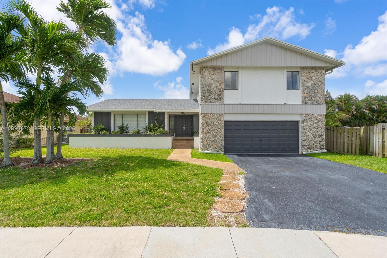 Fully remodeled and move-in ready home on an oversized 8,500+ SF lot in one of Sunrise’s premier communities! This 4BD/3BA residence offers over 2,300 SF of living space with a double-door foyer, formal dining area, sunken living room with fireplace, family room, and spacious utility room. Recent upgrades include a 2021 roof, renovated kitchen and baths, updated flooring, and more. Enjoy a large private backyard with a raised deck, paver patio, and ample space for a pool. Conveniently located near shopping, dining, major highways, FLL Airport, Sawgrass Mills, Amerant Bank Arena, and South Florida beaches.
