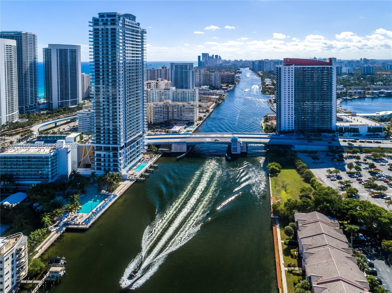 Amazing Turn-Key water-front Corner unit, brand new luxury condo resort. Unit comes fully furnished with a large wraparound terrace that overlooks breathtaking views of the ocean and Intracoastal. Five-star resort-style amenities with full service, access to an oceanfront private beach club and ocean access, two heated infinity oversized pools, state of an art gym, VIP Only Owner rooftop lounge, common area with BBQ, tennis court, racquetball court, high-speed internet in all public areas. Maintenance Fee includes electricity, cable, internet, and water. The perfect vacation home and at the same time your high-income-producing property. No rental restrictions!!! Airbnb short-term rentals approved!!