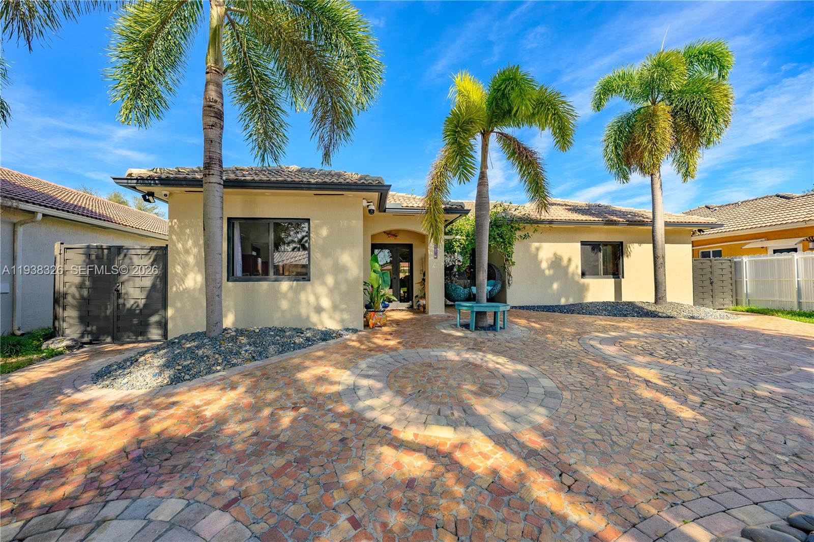 This is a rare opportunity to own a 4-bedroom, 3-bath home in Miami Lakes! Located in a quiet, established neighborhood with no HOA. This home is located short distance from Royal Oaks Park and features a newly redone pool, impact windows/doors, and brick pavers.