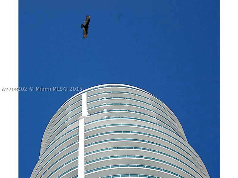 Enjoy the quality of this Ugo Colombo signature tower. Spectacular unit designed by renowned interior designer SAM ROBIN. Attractively priced for this 5B& 5.5BA, fully furnished residence. Contemporary architecture features and fine finishes. Grand living  spaces with impressive views of Biscayne Bay, Ocean & magical city lights. Room Office. Expansive Master suite. Media room. Private Elevator entry. Smart Home technology touch screen monitor. The exterior is as spectacular as the interior.