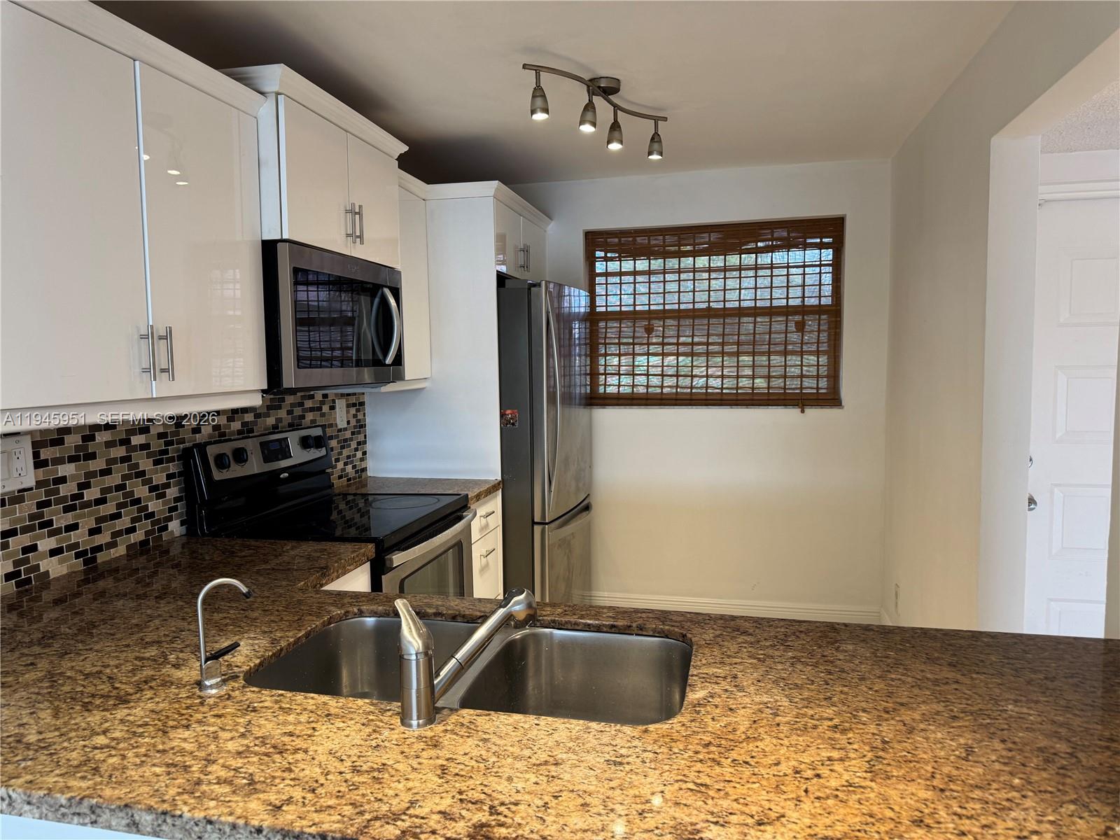 CONDO 2 OF SABAL PALM CON - Residential