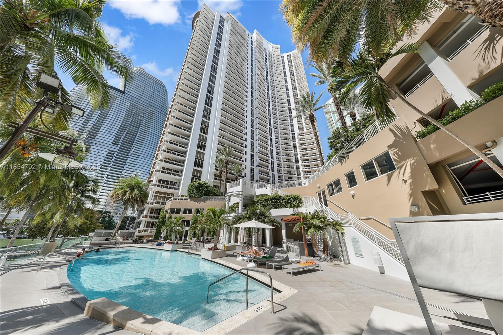 Stunning Bayfront Residence at Carbonell on Brickell Key - a spacious 1-bedroom, 1.5-bathroom residence offering 1,076 SF of living space. Soaring high ceilings and floor-to-ceiling windows frame sweeping views of Biscayne Bay and the iconic Miami skyline. This thoughtfully designed condo features an open-concept layout ideal for modern living, with a sleek kitchen, generous living and dining areas, and a large primary suite with a walk-in closet with water views. Located on exclusive Brickell Key, Carbonell offers world-class amenities including tennis courts, a state-of-the-art fitness center, racquetball court, sauna, waterfront pool, concierge, valet service, and 24-hour security.
