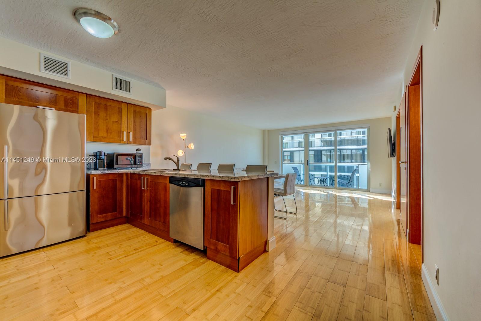 Corner residence in beautiful Spaggia on the beach. The condo spacious, open concept & modern  Large master bedroom and bath. Den is used as a 2nd bedroom or office / can accommodate children or nanny. SW corner full of sun  and more windows with gorgeous views ! Granite counter top and stainless steel appliances. Washer & dryer inside the apartment. The Spiaggia is a boutique style building with great amenities such as valet, 24hr security, beach service, fitness center. Located right across the Harding district with a variety of dining & shopping options right downstairs and walking distance to the Bal Harbour Shops and very close to house of worship. Next door to the trendyGrand Beach Hotel.