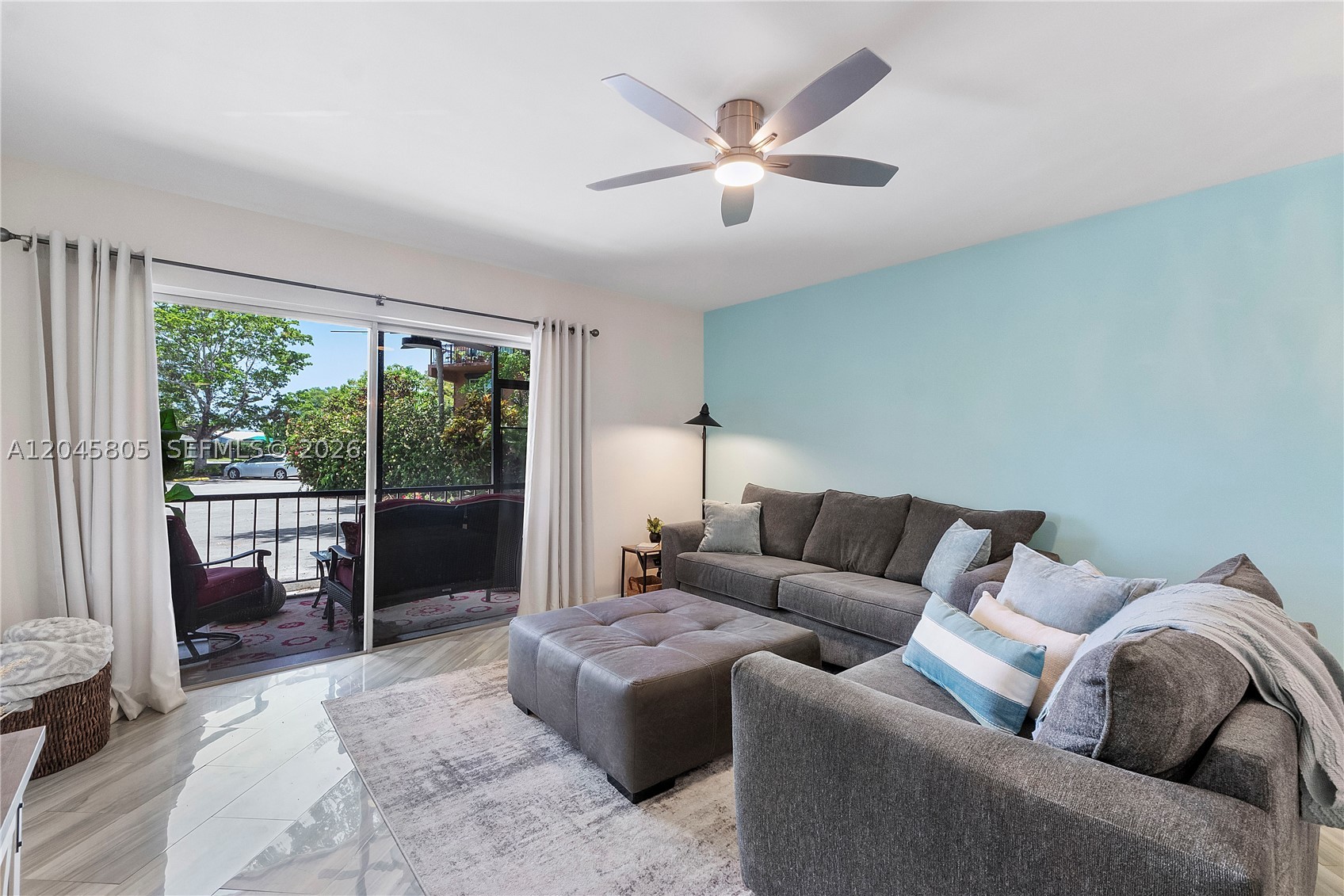 This 2 bed 2 full bath condo completely remodeled. Updates included the AC, HWH, electrical, flooring, new kitchen, bathrooms, appliances, and paint. The second bedroom has its own private entrance and a full bathroom located off a hallway that can be locked for complete separation from the rest of the home. The main living space opens to a private, screened-in patio. The community features guard-gated security, an on-site restaurant and bar, a clubhouse, a pool, and a fully functional gym. The community also has good reserves and no known assessments, making it a great choice for anyone including a first time buyer or FHA / VA.  This is a cat only building