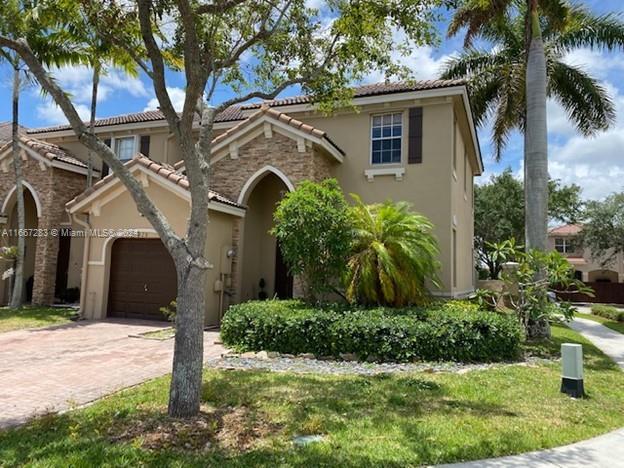**Discover Your Dream Home in Catalina Isles!** Welcome to this spacious 3-bedroom, 2.5-bathroom corner townhome, perfectly nestled in the serene Catalina Isles subdivision. Enjoy stunning lakefront views in addition to a lovely patio, ideal for relaxing and having summer barbecues! This two-story gem features a convenient one-car garage and a driveway that accommodates two vehicles, with ample visitor parking right out front. Inside, you’ll find a beautifully finished interior that boasts: Open Living Spaces: A separate dining room, cozy living room, and inviting family room. Gourmet Kitchen: Equipped with modern appliances, granite countertops, and a pantry for all your culinary needs. **TENANT OCCUPIED UNTIL OCT 31**