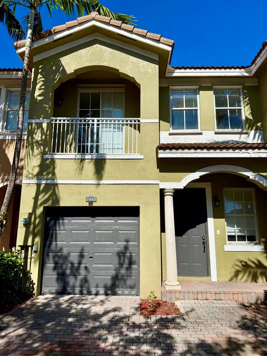 Welcome to this beautifully updated and move-in-ready 4-bedroom, 3-bathroom townhome, offering the perfect blend of modern style and functional design with an attached garage. The spacious, open-concept main floor features gorgeous, brand-new wood-look luxury flooring, fresh neutral paint, and a bright, inviting living space. The pristine kitchen boasts contemporary white shaker cabinetry, premium stainless steel appliances, sleek quartz countertops, and a breakfast bar that flows effortlessly into the dining and family areas—ideal for entertaining.

A highly desirable, full bedroom and full bathroom are conveniently located on the first floor, providing the perfect setup for guests, an in-law suite, or a private home office. Step through the sliding glass doors to a private, fenced backyard space, perfect for outdoor relaxation. Upstairs, you will find additional spacious bedrooms, including a serene primary suite.

Enjoy total peace of mind with a brand-new HVAC system, ensuring peak energy efficiency and comfort year-round. Located in a fantastic community close to shopping, dining, and local amenities, this turnkey property is a must-see!  Square footage is incorrect on MLS and is actually a spacious 1,882 square feet, we are working on correcting.  

Located in a secure gated community with a gym and pool.  Low HOA fees include cable and internet.
