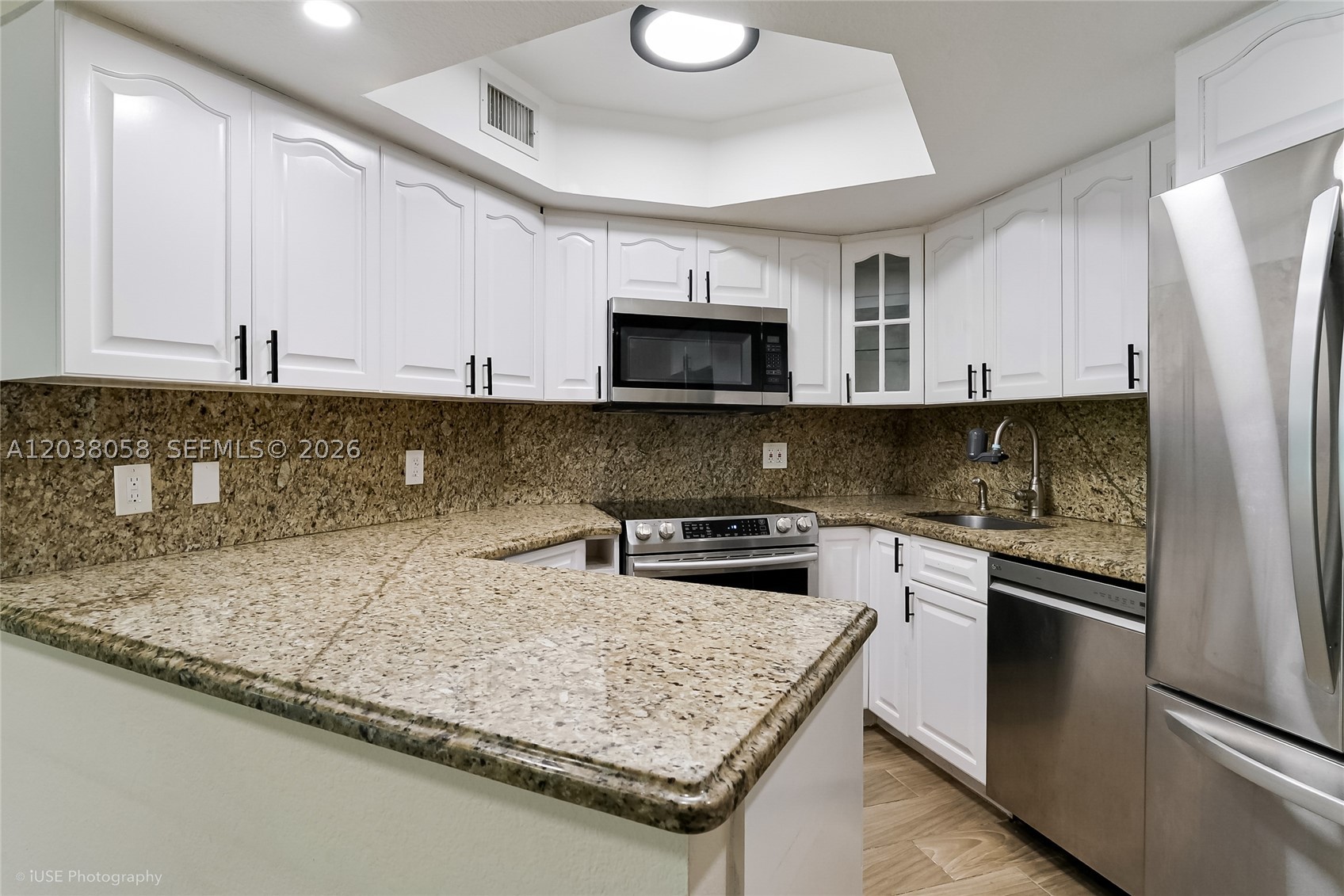 Beautifully updated 2/2 in Las Vistas at Doral. One of the largest units that is completely and tastefully remodeled including all impact glass windows and sliders. Large living areas and bedrooms with a full size washer/dryer inside the unit. Las Vistas has three tennis Courts, 4 pools with a Jacuzzi. Home is very close to the main highways, Downtown Doral, schools, and CityPlace Doral. Gated community with 24 hour security patrol.