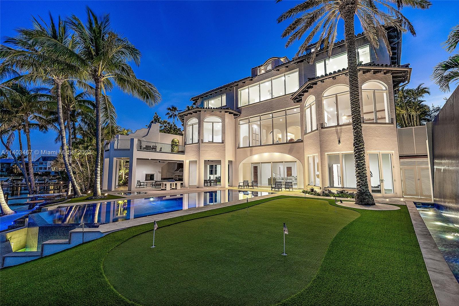 One-Of-A-Kind Grand Intracoastal Estate on Turquoise Blue Water - It doesn't get any better than this location. A massive two year project updating this contemporary home was recently completed. Features include sleek and clean lines, wood floors, floor to ceiling picture glass windows with unsurpassed Intracoastal views as far as the eyes can see. Plenty of room to accommodate a large family and guests with 9 Bedrooms, 5 in the main house and a 4-bedroom guest house with a private courtyard entrance, 5th floor observation deck with views of the Atlantic Ocean. If you want luxury and privacy this property is for you...every conceivable amenity in your own home.