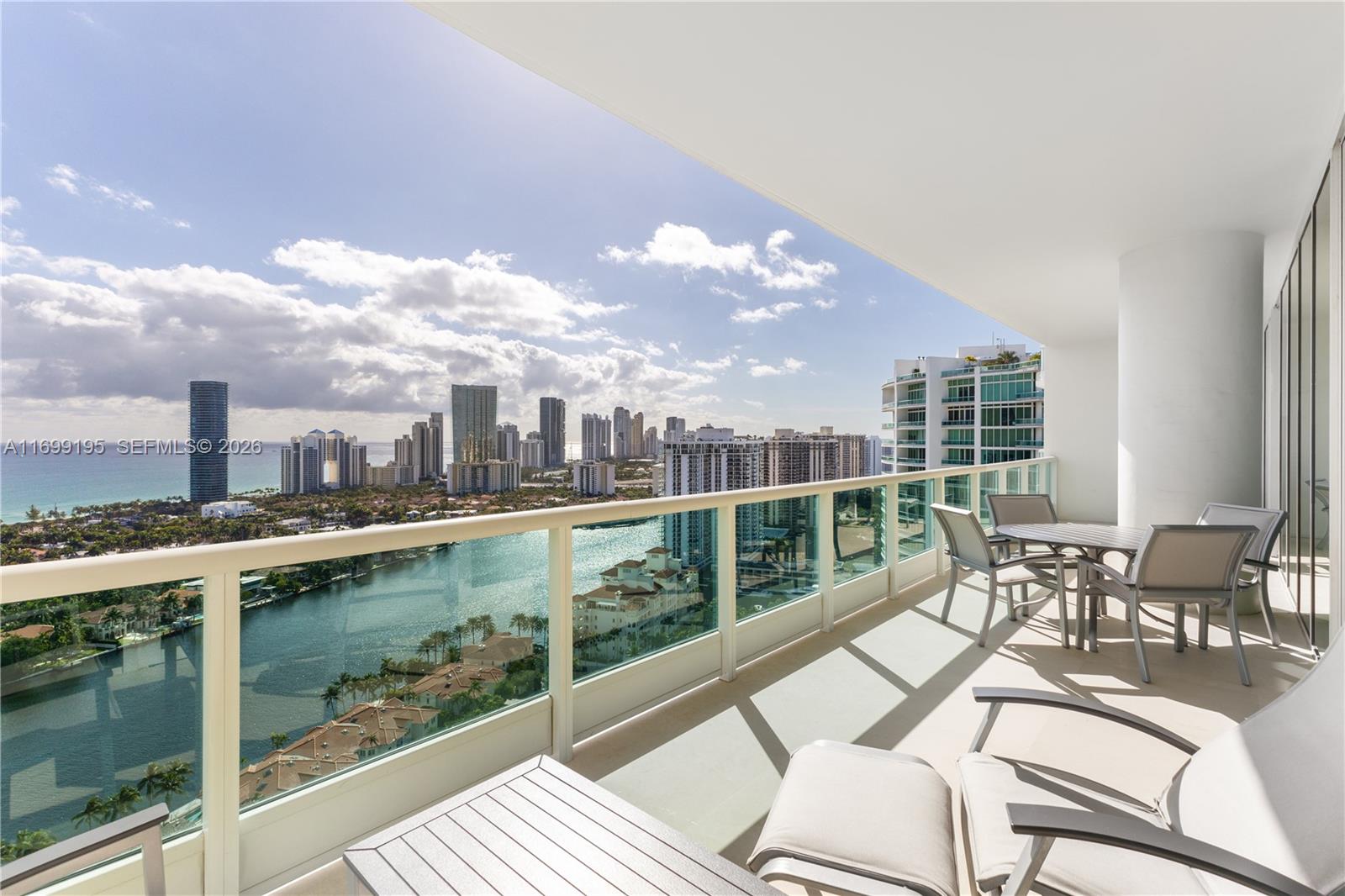 Porto Vita: Luxury and comfort combined to create a lifestyle you won’t want to give up. This gorgeous and roomy property is one of the top picks in the complex, with beautiful marble floors and floor-to-ceiling windows from the 29th floor that let in tons of natural light and offer amazing views. 
Two primary ensuite bathrooms, flow-through views, and more closet space than you’ll know what to do with are included.
Porto Vita is all about service, making you feel at home when you arrive. You’ll enjoy 24/7 security and fun amenities like tennis courts, great restaurants, a cool bar, and sports facilities for pickleball, soccer, and basketball. Plus, there’s a lounge just for the kids!