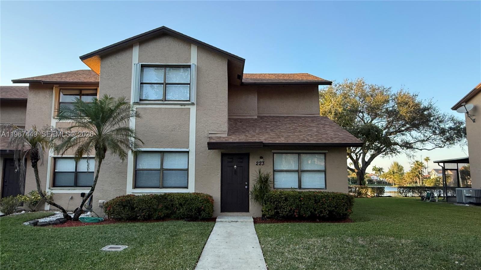 READY TO MOVE IN - WESTON AREA! BEAUTIFUL AND SPACIOUS 3-BEDROOM, 2.5-BATHROOM CORNER-UNIT TWO-STORY TOWNHOME OFFERING 1,876 SQ FT OF LIVING SPACE WITH SERENE LAKE VIEWS. THIS WELL-MAINTAINED HOME FEATURES NEWLY RENOVATED BATHROOMS, NEW FLOORING, AND FRESH PAINT THROUGHOUT. ENJOY A LARGE OPEN LIVING AND DINING AREA, PLUS AN ADDITIONAL DEN-IDEAL FOR A HOME OFFICE OR EXTRA SITTING AREA. THE SCREENED PATIO OVERLOOKS THE LAKE, PROVIDING A PEACEFUL OUTDOOR SPACE TO RELAX AND UNWIND. WASHER AND DRYER CONVENIENTLY LOCATED INSIDE THE UNIT. TWO ASSIGNED PARKING SPACES. WITH ADDITIONAL GUEST PARKING AVAILABLE. LOCATED IN THE HIGHLY DESIRABLE WESTON AREA, KNOWN FOR ITS BEAUTIFUL COMMUNITIES AND TOP-RATED SCHOOLS. COMMUNITY AMENITIES INCLUDE A POOL, TENNIS COURTS, AND BASKETBALL COURTS. JUST MINUTES FROM SHOPPING, DINING, PARKS, AND MAJOR HIGHWAYS FOR EASY COMMUTING.