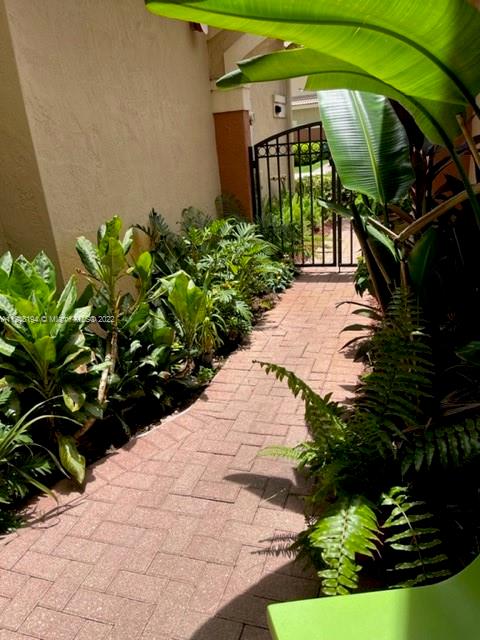 BEAUTIFUL 2/2.5 UNIT AT COURTYARD AT THE GROVE. WITHIN STEPS OF FALCON COVE AND CYPRESS BAY AND WALKING DISTANCE TO MANATEE BAY ELEMENTARY SCHOOL.  BEAUTIFUL NEUTRAL TILES ON FIRST FLOOR, UPDATED EAT-IN KITCHEN WITH WASHER AND DRYER CLOSET AND NEW CABINETS WITH GRANITE TOPS AND STAINLESS STEEL APPLIANCES. LARGE LIVING ROOM WITH SPACE FOR SITTING AREA. PORCH IS SCREENED AND OVERLOOKS GARDEN. ONE CAR GARAGE WITH PAVERS DRIVEWAY. THIS UNIT HAS BEEN LOVINGLY CARED FOR BY OWNERS AND IS ONE YOU MUST NOT MISS!