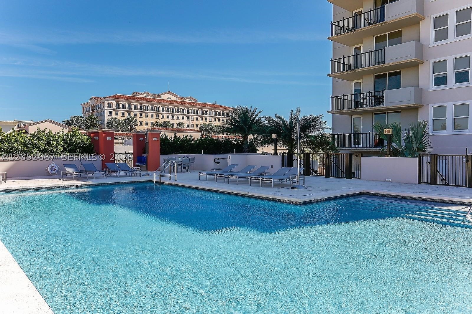 Beautiful 2 BR/2BA condo for rent at One Village Place. This spacious unit features stainless steel appliances, European-style cabinetry, granite countertops, laminate wood floors throughout, marble bathrooms, and city views. Enjoy resort-style amenities including a pool with sun deck, fitness center, residents lounge, 24/7 concierge, and security. One assigned parking space included, plus guest parking. Prime location within walking distance to the Shops at Merrick Park, restaurants, cafes, and entertainment, with easy access to Coral Gables, Coconut Grove, UM and more!