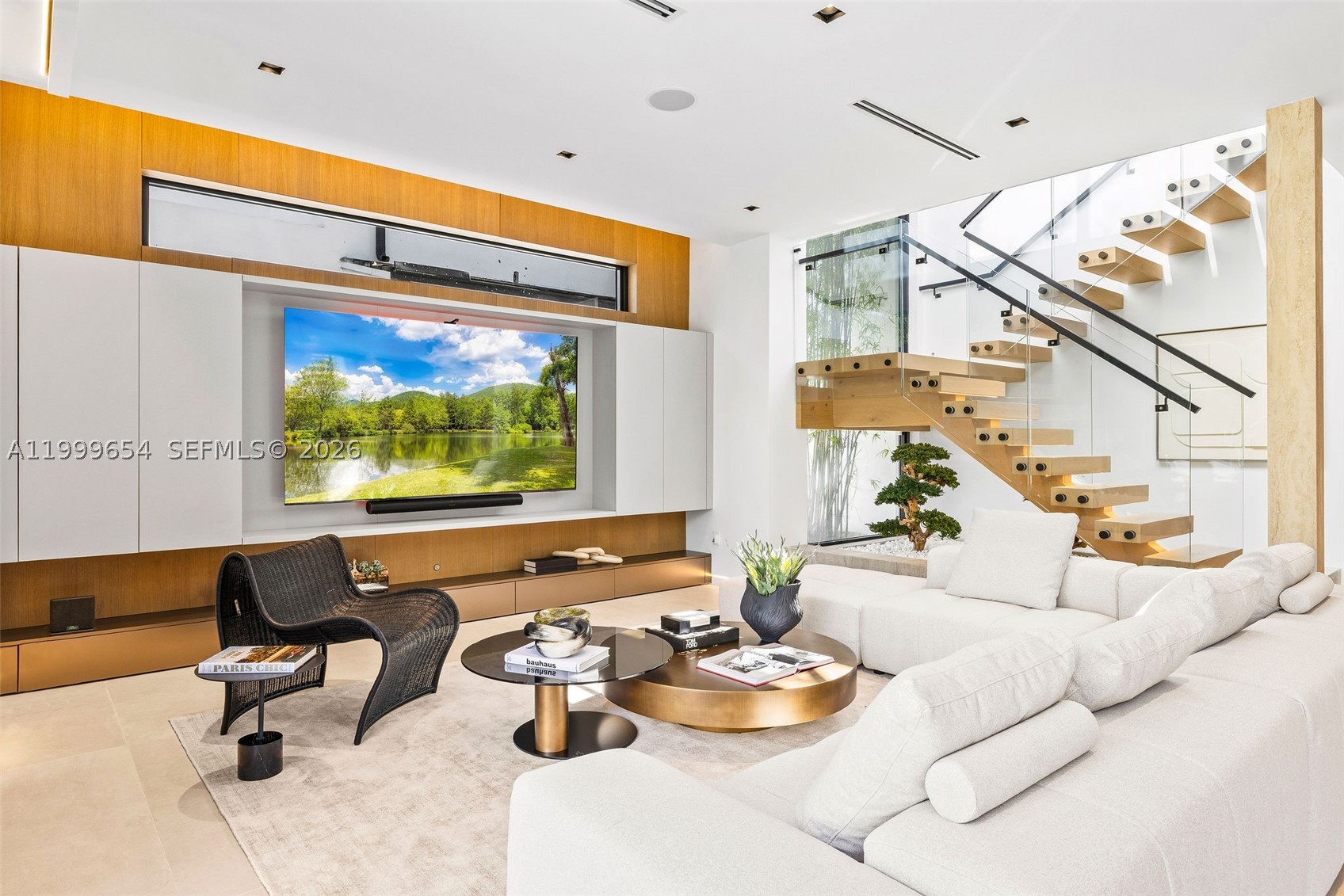 Striking modern design meets warm, livable luxury in this brand-new 2-story residence offering 3 bedrooms and 3.5 bathrooms. Clean architectural lines, soaring ceilings, and dramatic walls of glass create a light-filled, gallery-like space designed for both everyday living and elevated entertaining.

At the heart of the home, a showpiece kitchen features imported Italian porcelain slab countertops, a bold waterfall island, custom cabinetry, integrated wine storage, and a premium Sub-Zero appliance package.

Seamless indoor-outdoor living defines the experience as oversized sliding doors open to a private, resort-style backyard with pool, spa, expansive terrace, and lush tropical landscaping.

The upstairs primary suite is a true retreat, complete with floor-to-ceiling glass, a spa-inspired marble bathroom with freestanding soaking tub, floating vanities, and boutique-style custom closets.

Thoughtfully curated throughout with a floating staircase, custom millwork, designer lighting, and 10-foot hingeless doors.

A refined, design-forward home that stands apart from typical new construction. 

Stunning in photos - unforgettable in person! 

Call Jaclyn to set up a showing.