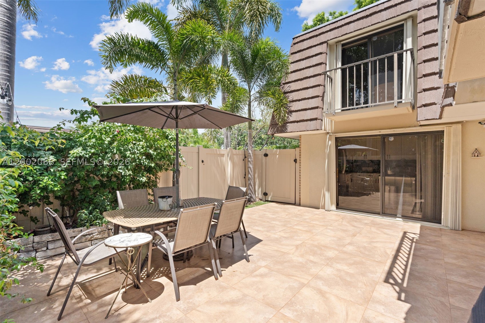 Outstanding opportunity for an Investor or First-Time Buyer. The monthly HOA of approximately $501 delivers exceptional value, covering water, sewer, trash, high-speed internet (Blue Stream Fiber), landscaping, insurance, and common areas—creating a truly low-maintenance, predictable ownership experience.  Investor-friendly with a minimum 4-month rental policy, offering strong rental flexibility and consistent demand potential—ideal for both long-term holds and seasonal use. Fully renovated and move-in ready, this 2-bedroom, 2.5-bath townhome offers 1,236 sq ft of modern living in a highly desirable West Palm Beach community. From the moment you arrive, you’re welcomed by a private, gated patio—perfect for relaxing or entertaining. The home has been completely updated with a clean, contemporary design featuring quartz countertops, brand-new stainless steel appliances, new lighting throughout, and beautifully renovated bathrooms with stylish tile and modern finishes. The layout offers two spacious bedrooms, each with its own updated bathroom, plus a convenient half-bath downstairs for guests. Custom built-in closets provide excellent storage and functionality. Ideally positioned within the community, enjoy added privacy along with close proximity to the pool and amenities. 
Conveniently located near shopping, dining, parks, and major roadways with easy access to beaches and downtown West Palm Beach. Minutes from Palm Beach Outlets, City Place, and Okeeheelee Park.