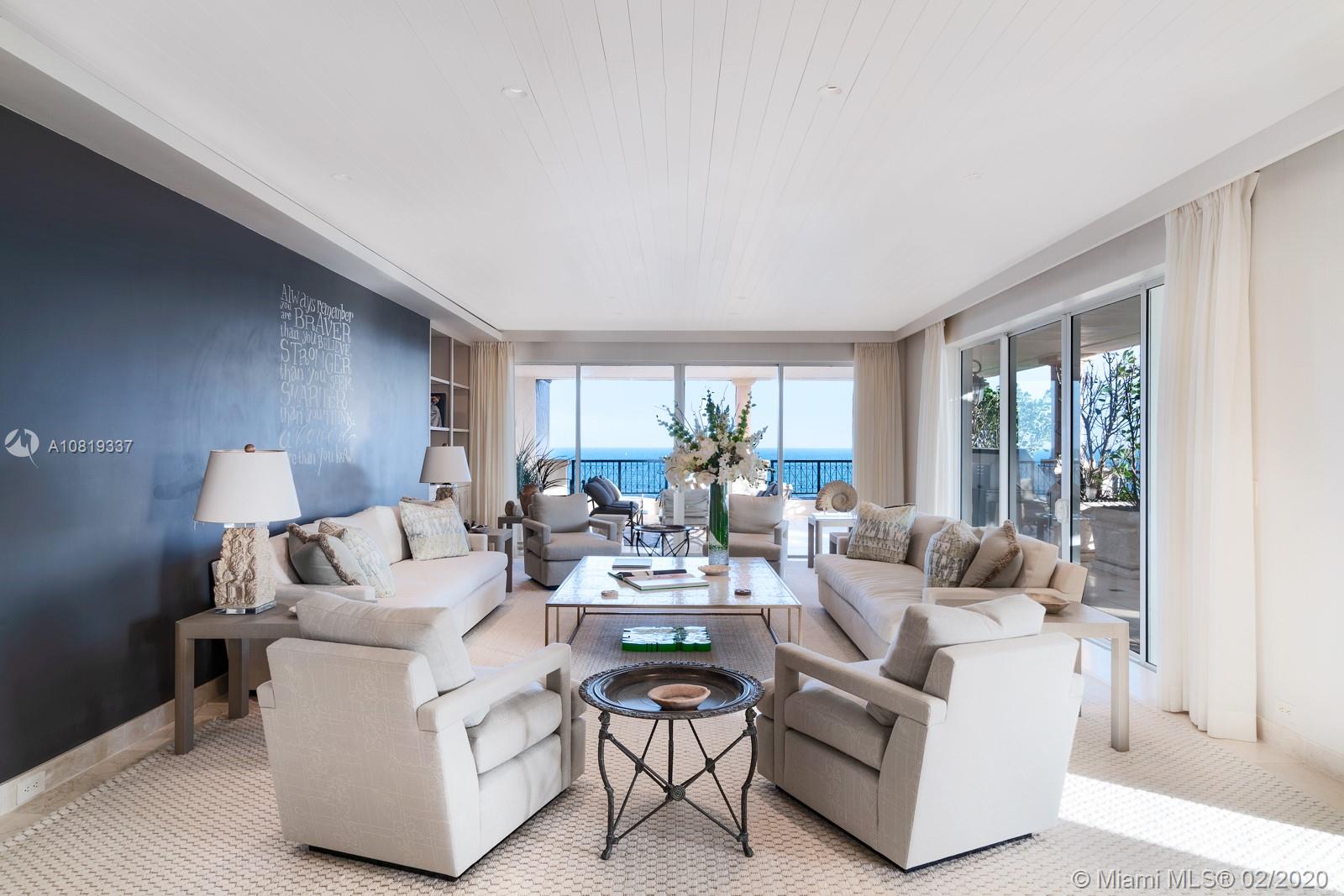 One of a kind Oceanside corner Unit boasts 3,692 SF. Spectacular Ocean and City views with over 1,800 SF of wrap around terrace. Exquisite 3 Bed/ 4.5 bath renovated by world class builder, Handcraft. The home features Crestron home automation system, Miele appliances and Waterworks fixtures throughout. His/Hers Master baths and walk-in closets with Luxurious Steam Shower.
Two parking spots, one golf cart spot, and large storage unit.