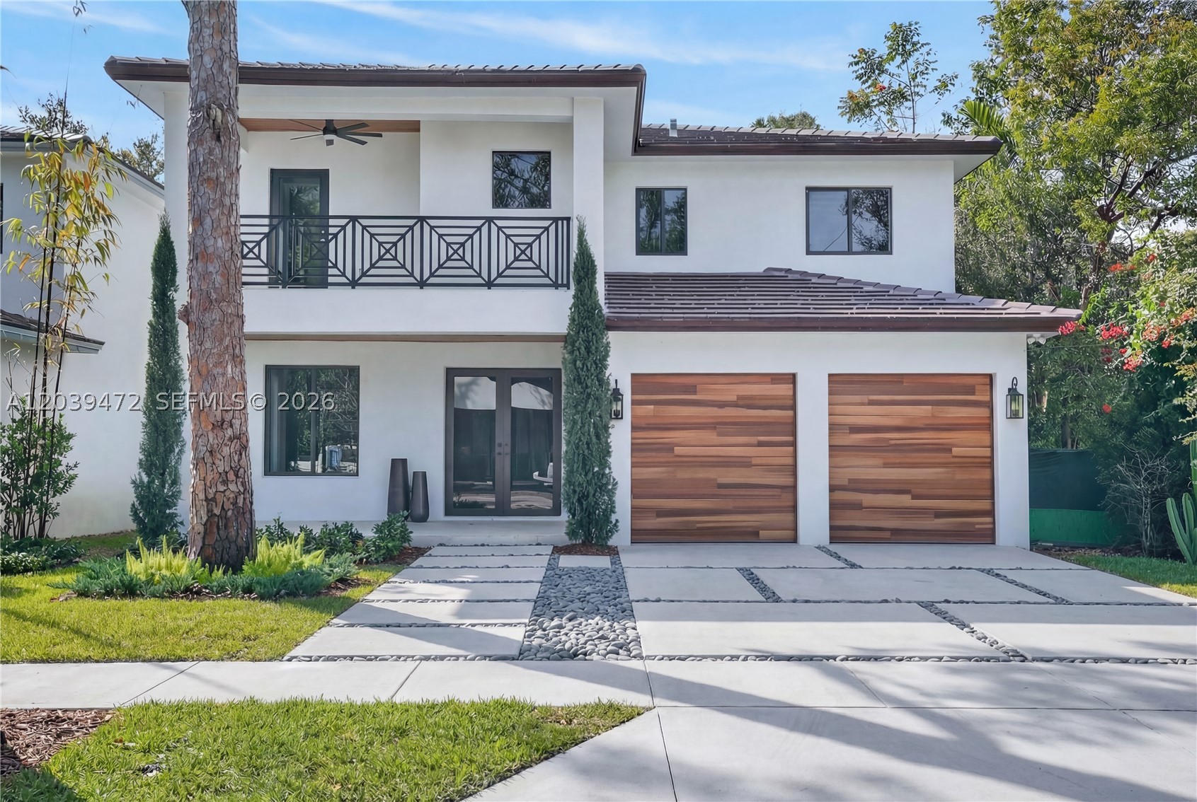 Exceptional residence perfectly situated just minutes from South Miami, blending timeless elegance with contemporary comfort while offering close proximity to premier shopping, dining, and top-rated schools. Thoughtfully designed with refined finishes throughout, the custom white oak kitchen is complemented by exquisite Taj Mahal quartzite countertops and outfitted with top-of-the-line JennAir appliances. Spa-inspired bathrooms feature bespoke vanities with Taj Mahal quartzite surfaces and natural marble shower walls. The serene primary suite offers a private retreat, highlighted by luxurious fixtures and a sophisticated, resort-like ambiance.
Images have been digitally enhanced for virtual staging purposes.