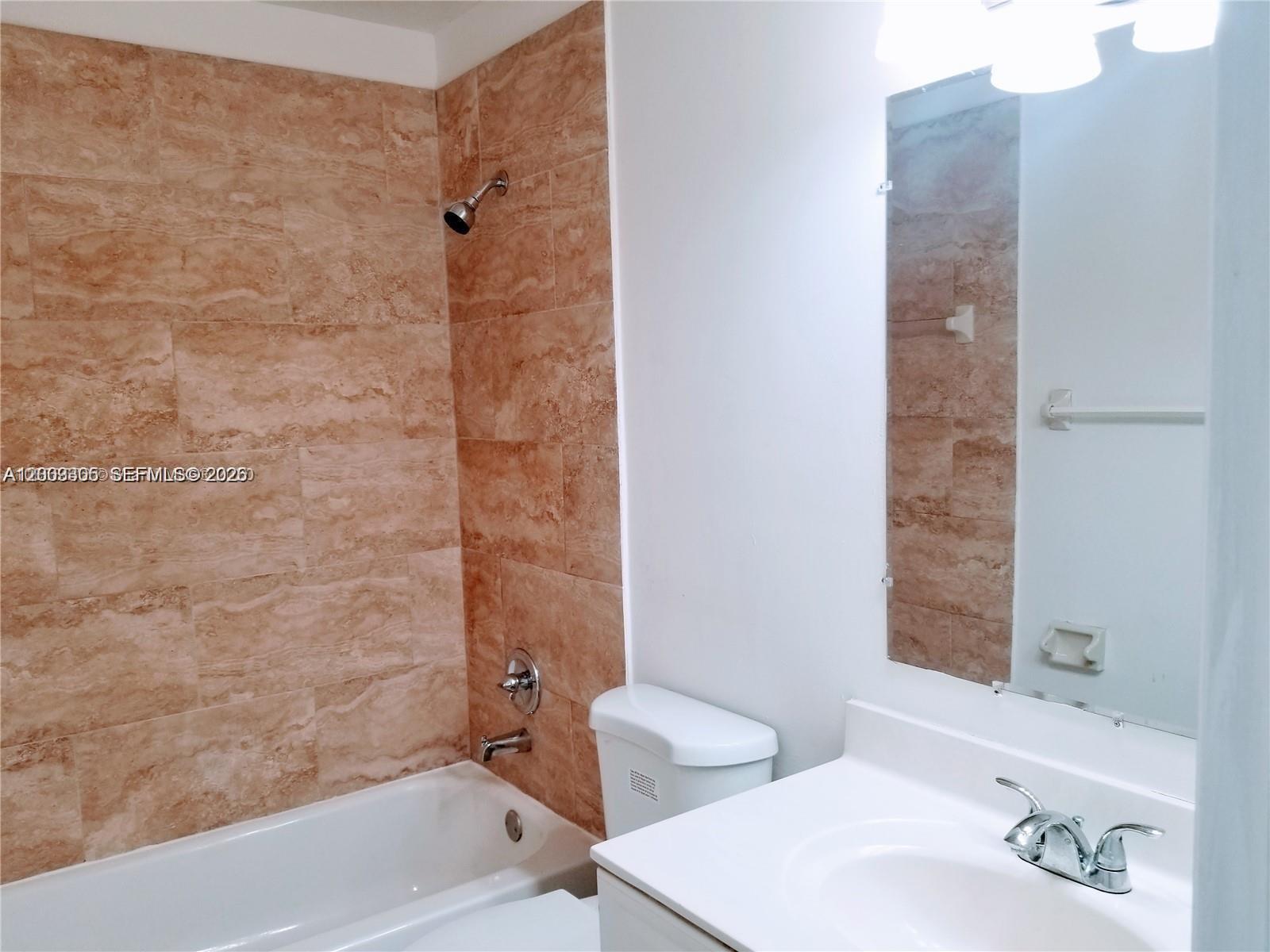 WOODSCAPE TOWNHOMES CONDO - Residential Lease