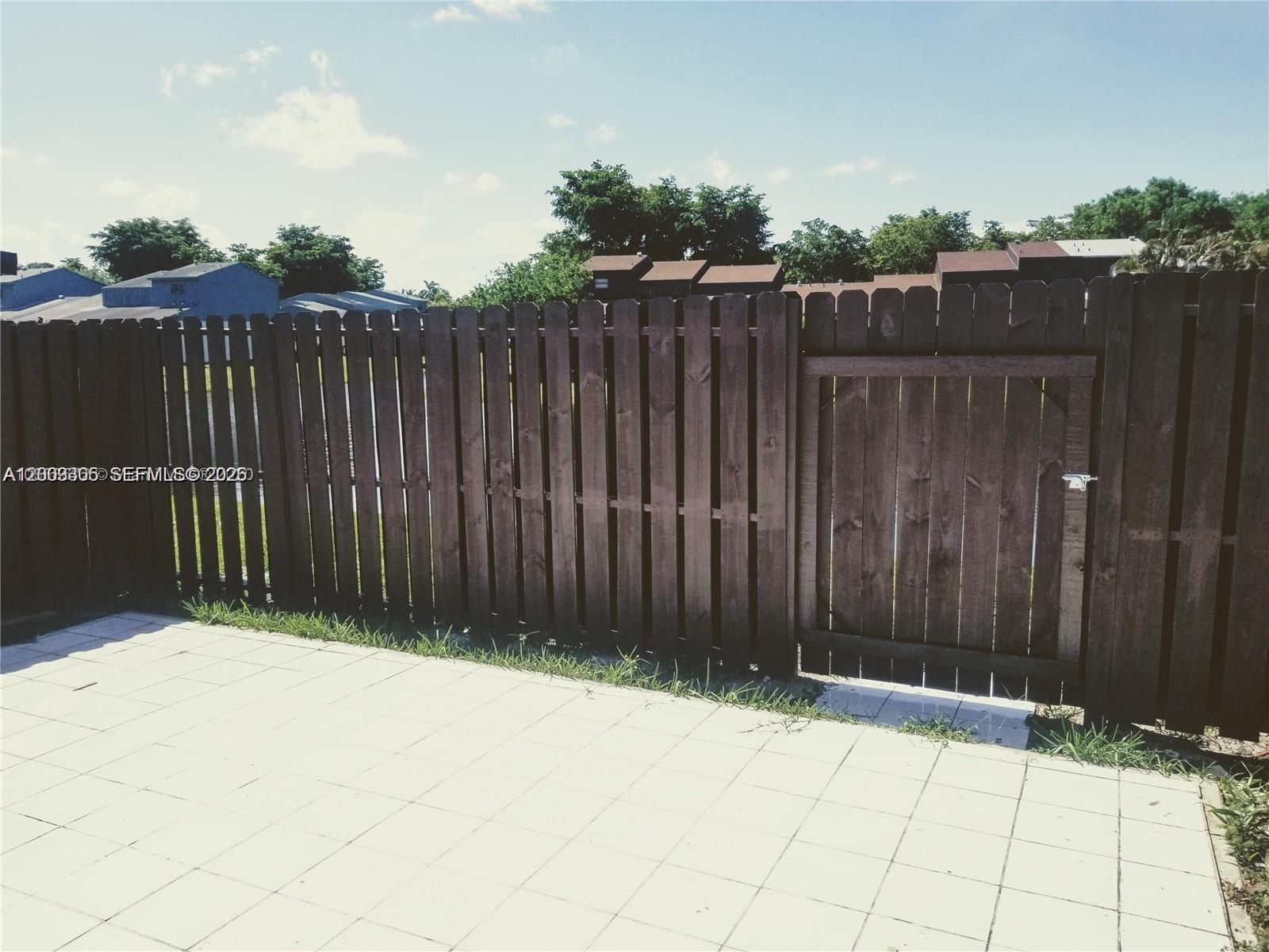 WOODSCAPE TOWNHOMES CONDO - Residential Lease