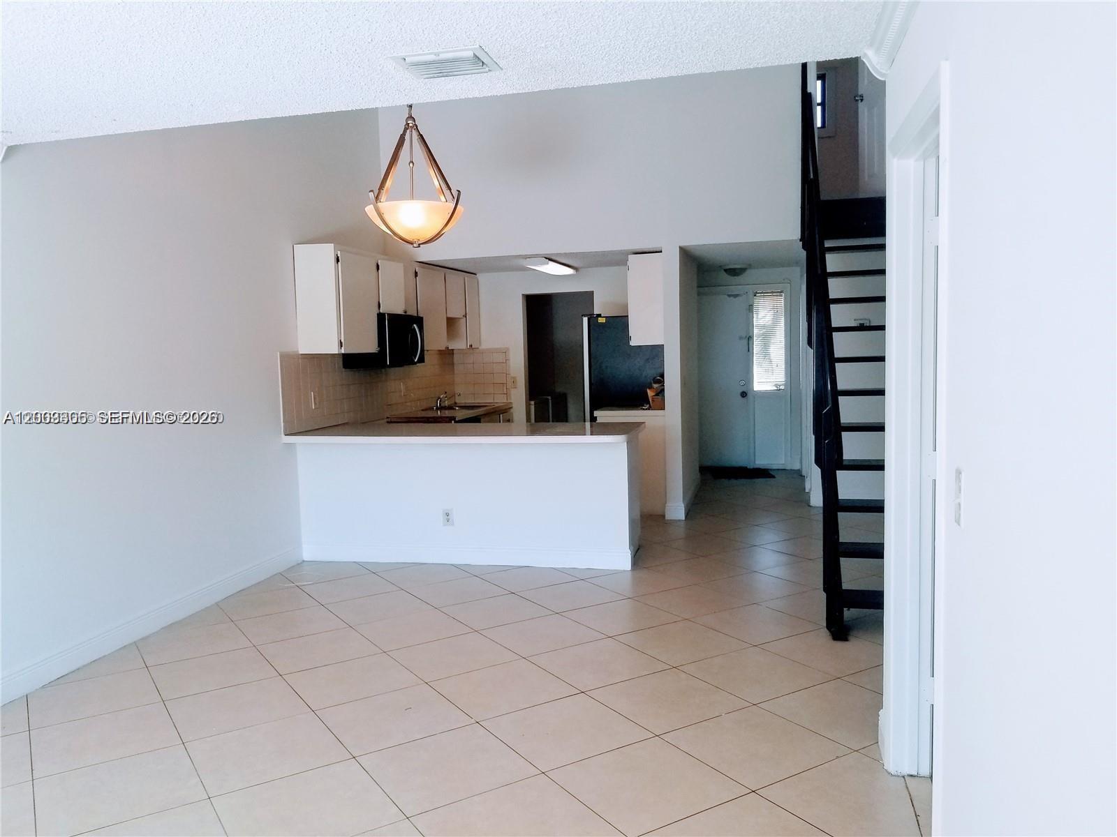 WOODSCAPE TOWNHOMES CONDO - Residential Lease