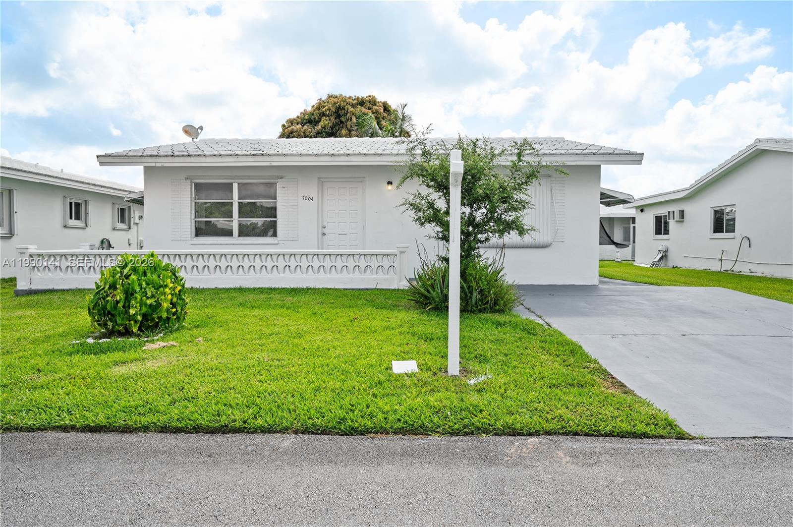 Cozy 2 Bedroom, 1.5 Bath Home nestled in the Heart of 55+ Mainlands of Tamarac is ready for new ownership. Granite Counters, Tile Floors Throughout, 6 Year old Roof, Spacious Living Room and an Inviting Front Porch perfect for Entertaining. Best of All the Club House offers a Heated Community Pool, Pickleball, Bingo, Yoga, Line Dancing, and host of other actives.