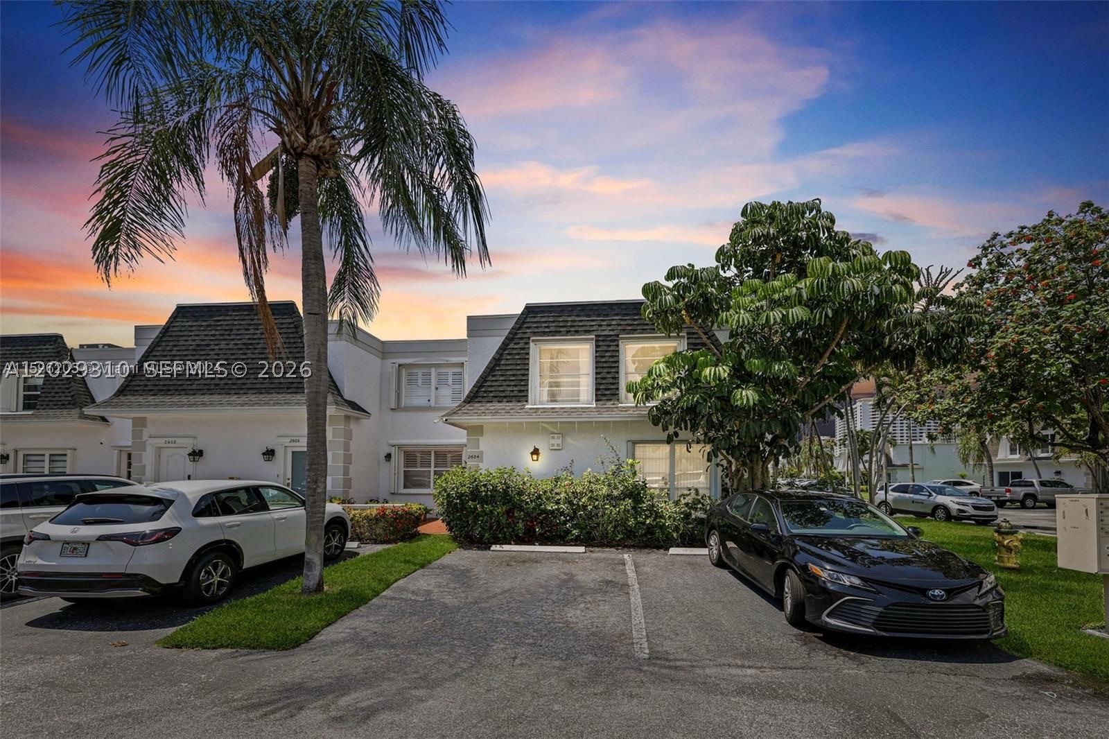 THIS IS A DREAM COME THRU .....GORGEOUS & VERY CHARMY BEAUTIFULLY REMODELED & FURNISHED 2 BEDROOM + 2.5 BATH TOWNHOME IN DESIRED VENETIAN PARK FEATURING AN OPEN AND INVITING FLOOR PLAN WITH HUGE PATIO AREA . IMPACT WINDOWS AND DOORS ,BRAND NEW BATHROOMS ,NEWER KITCHEN ,POPCORN CEILING REMOVED ,NEW WATERPROOF VINYL FLOORS UPSTAIRS AND MUCH MORE .The fully upgraded kitchen boasts expansive cabinet space, sleek stainless steel appliances, elegant granite countertops, and a spacious island—perfect for entertaining! The kitchen seamlessly flows into a private patio, offering direct access to the tennis courts for an active lifestyle.Upstairs, you'll find generously sized bedrooms with multiple walk-in closets and a master suite that includes its own private balcony. Located just minutes from pristine beaches, vibrant downtown, top-tier golf courses, and the racetrack, this home offers the perfect blend of comfort and convenience. WASHER AND DRYER IN THE PROPERTY ,2 ASSIGNED PARKING SPACES RIGHT IN FRONT OF THE HOUSE . CLOSE TO THE BEACH ,SHOPPING ,RESTAURANT ,PARKS ,FAMILY FRIENDLY .....HOUSE SHOWS BEAUTIFULLY !STOP AND SEE THE BEAUTY