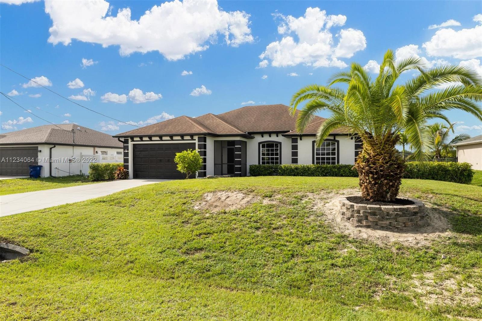 Beautiful Home located in a great area in Lehigh Acres, very close to State Road 82 and Fort Myers. This Spacious home has 4 bedrooms, two baths, and an updated kitchen with a spacious living room area. Another great feature of this property is the beautiful backyard with a resort-like pool. The lot behind the property is owned by the current owners and it's negotiable which would make this a half Acre property. This property won't last long, schedule your private showing today!