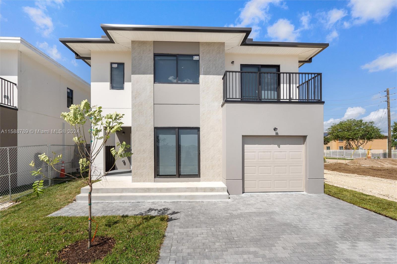 Ready to move in! New Construction Homes! Introducing On Alba: A new construction home by Onx Homes
featuring Pure Concrete Home built with X+ Construction technology. Currently under construction, Corner Unit
Model A Collection O with Taupe Facade offers 5 bedrooms, 4.5 baths, including a guest suite with full bath on the
first floor. The home boasts high-impact glass windows, high ceilings, the kitchen features a comfortable island,
stainless steel appliances, soft-close cabinets, quartz countertops, built in pantry. LED lights, and an EV charger
port connection included in the garage. Laundry with washer and dryer included.