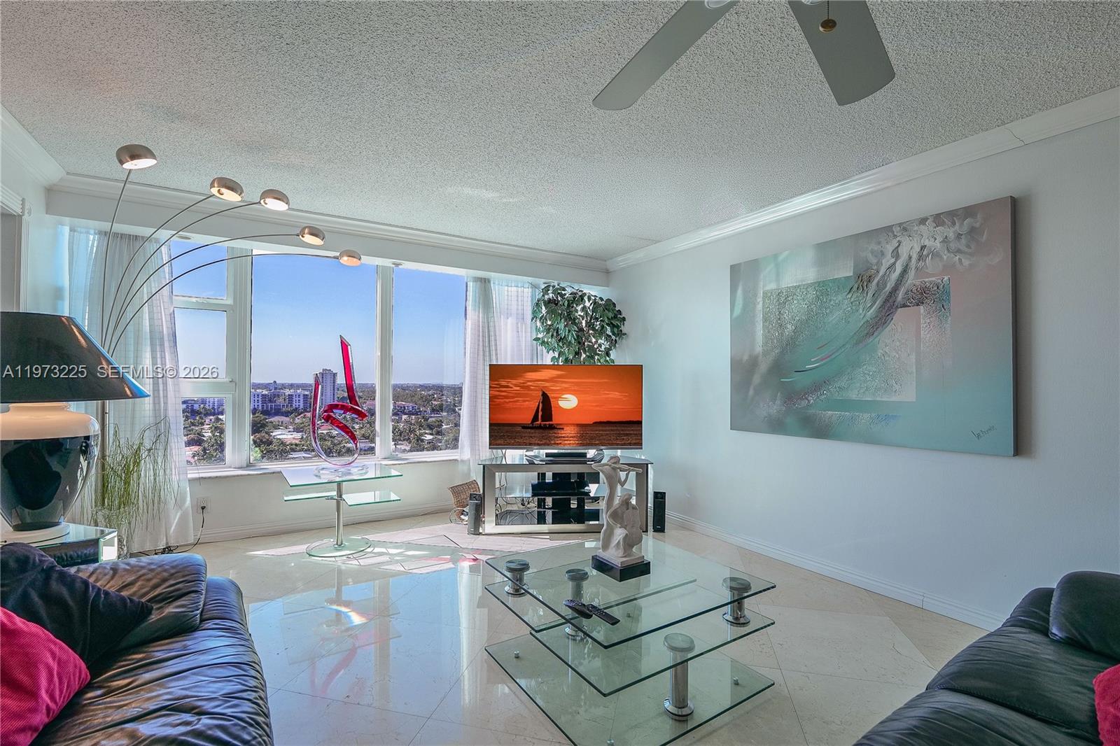 LUXURIOUS HIGH END PENTHOUSE CONDO WITH SPECTACULAR SUNSETS VIEW, INTERCOSTAL AND CITY LIGHTS FROM THE PRIVATE PATIO. THIS COMPLETELY REMODELED 2/2 UNIT IS LOCATED IN THE HEART OF LAUDERDALE-BY-THE-SEA, WITH DIRECT ACCESS, WHERE YOU CAN ENJOY THE BEAUTIFUL DEEDED BEACH. THIS ELEGANT UNIT FEATURES MARBLE FLOORS THROUGH OUT, A NICE GOURMET KITCHEN WITH GRANIT COUNTERTOPS & STAINLESS STEEL APPLIANCES, EXQUISITE BATHROOMS WITH FLOOR TO CEILING MARBLE WALLS.  WITH COMPLETE PANORAMIC IMPACT WINDOWS AND DOORS ,THIS UNIT PROVIDES A LOT OF DAY LIGHT. TOP FLOORS ARE THE BEST FOR TRANQUILITY IF YOU'RE LOOKING TO ESCAPE FROM DAILY STRESS OR FOR CREATIVE WORKING ENVIRONMENT. IT HAS IT ALL. CLOSE TO A MULTITUDE OF RESTAURANTS, ENTERTAINMENT, GROCERIE STORES, PHARMACIES AND MORE. COME SEE THAT GEM !! EASY TO SHOW !!