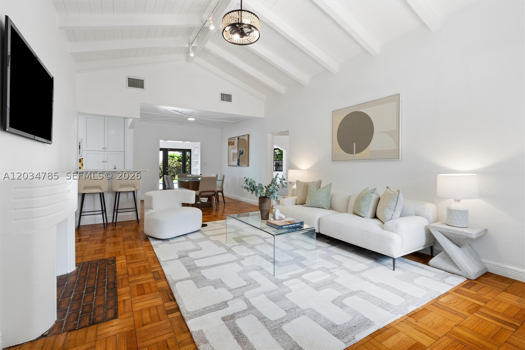 Tropical Retreat in the Heart of Miami Beach! Experience the best of Miami Beach living in this beautifully updated 4-bedroom, 2-bath residence, ideally situated in one of Mid-Beach’s most desirable neighborhoods. Designed for both comfortable everyday living and effortless entertaining, the home features soaring vaulted ceilings, warm wood floors, an open-concept kitchen, and spacious bedrooms filled with natural light.

Step outside to your own private oasis, where a sparkling pool, expansive wooden deck, and lush tropical landscaping create the perfect setting for relaxing or hosting family and friends.

Located just moments from the beach and the vibrant 41st Street corridor, you'll enjoy easy access to some of Miami Beach's most popular destinations, including the Fontainebleau, Soho Beach House, the Miami Beach Golf Club, Mount Sinai Medical Center, and a variety of acclaimed restaurants, cafés, fitness studios, and boutique shopping. With quick access to South Beach, Sunset Harbour, Design District, and Downtown Miami, this central location offers the ultimate blend of convenience and lifestyle.