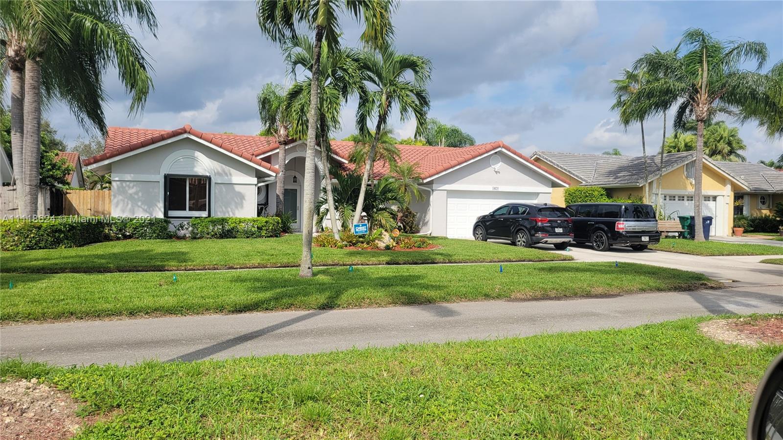 Attention! Attention! Come take a close look at an amazing turnkey jewel of a home in a great neighborhood of manicured homes. This pristine home has been maintained to the max, it was to be the ultimate retirement home; but, plans have changed. It features a 3-year new  s-tile roof, a 3-year new A/C system, Stainless Appliances, Washer Dryer, and all new storm windows and doors, with accordion shutters,  rain gutters, and natural lighting, ( not to forget Marble floors). Also, featured is a beautifully landscaped yard with easy-to-maintain flower beds and lush Lychee nut fruit trees of the Hak IP and Mauritius cultivar.
This beautiful home is just 7 mins away from the TP, 826 and 874, it is also close to major shopping and schools.