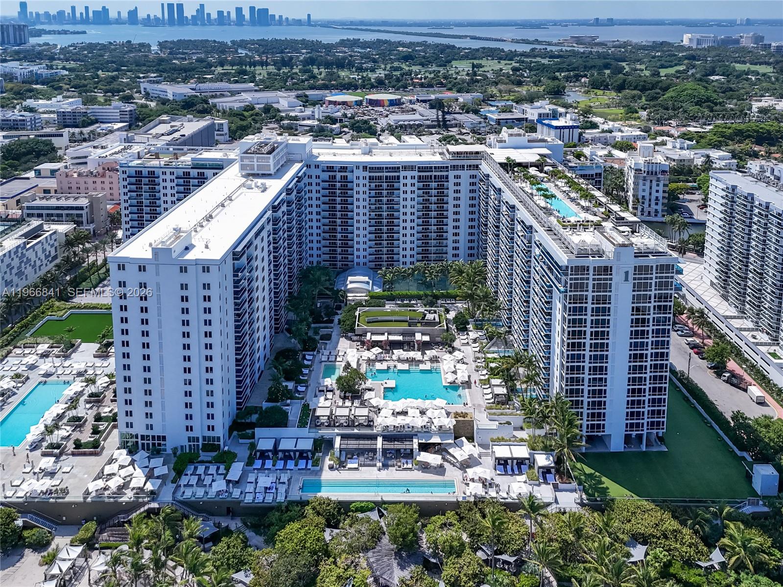 Discover the pinnacle of Miami Beach living in this turnkey 3-bed, 3-bath penthouse at 102 24th St #PH-1705, offering 1,943 SF of modern elegance. Bright and open with oak hardwood floors, spa-like baths, and a sleek kitchen with Sub-Zero and Bosch appliances, it comes fully furnished with the hotel’s curated package. Bask in sweeping ocean and Intracoastal views, then indulge in 5-star amenities: 600 feet of beachfront, four pools, rooftop lounges, spa, 14,000 SF fitness center, farm-to-table dining, concierge, chauffeured Tesla, and 24-hr in-room service. In the heart of South Beach, with flexible daily rentals, it’s the ultimate lifestyle and investment surrounded by world-class dining and enterntainment.