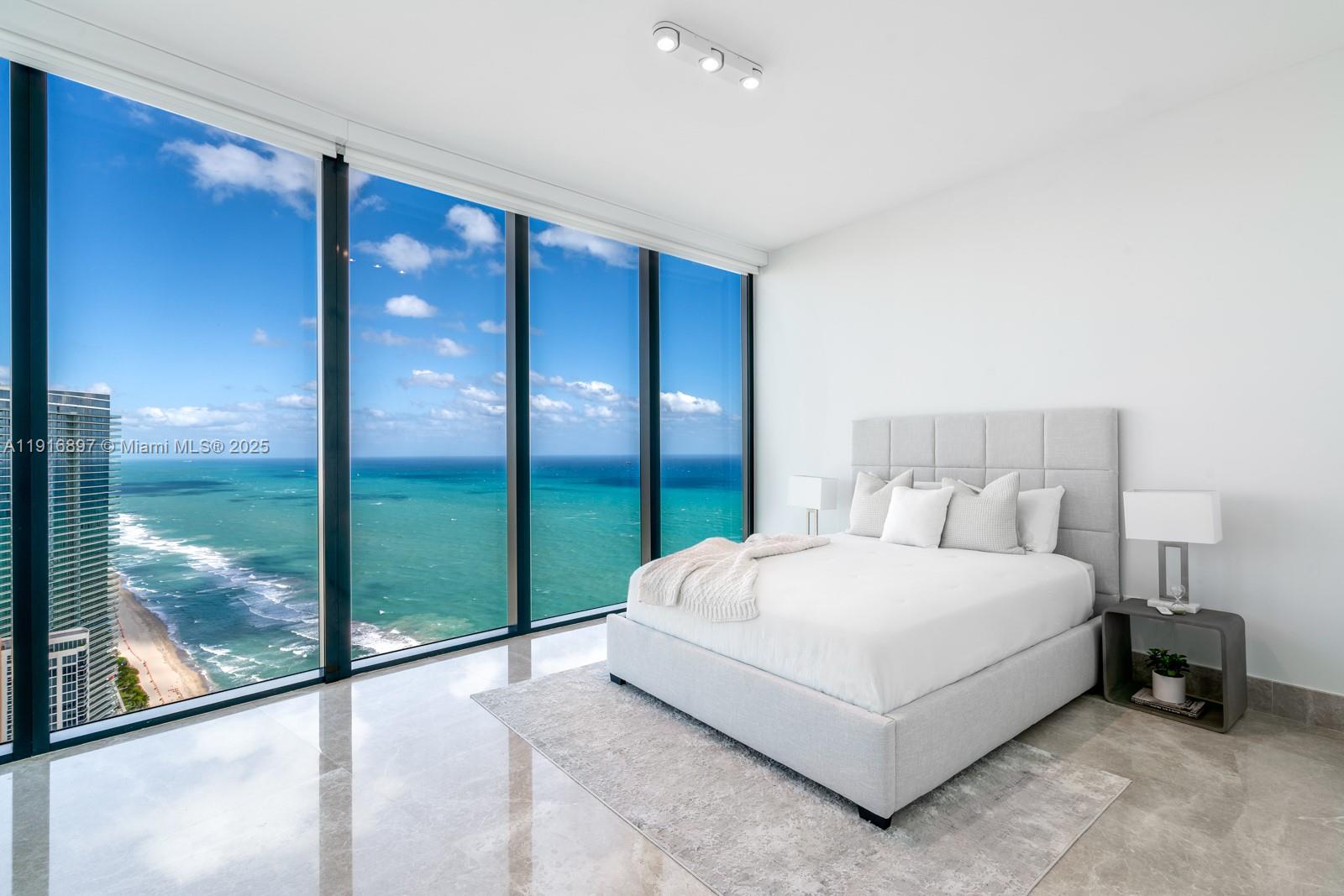 Live above it all in this spectacular 4-bedroom mansion in the sky at the iconic Porsche Design Tower—where engineering, exclusivity, and oceanfront lifestyle meet. Perched 51 stories high, this residence offers the most unobstructed Atlantic views in the tower. Drive into your private 2-car sky garage and enter a world of refined luxury: marble floors, TOTO smart toilets, automated blinds, custom closets, and a stunning Poggenpohl kitchen with Miele appliances. A private balcony pool and summer kitchen create the ultimate oceanfront sanctuary. Indulge in unmatched building amenities including room service, private chef, full restaurant & bar, spa, fitness center, and premier security. A residence crafted for those who expect only the extraordinary.
