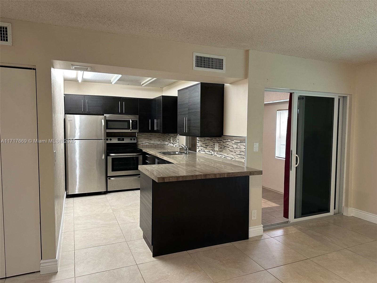 WOOD HUE II CONDO - Residential Lease