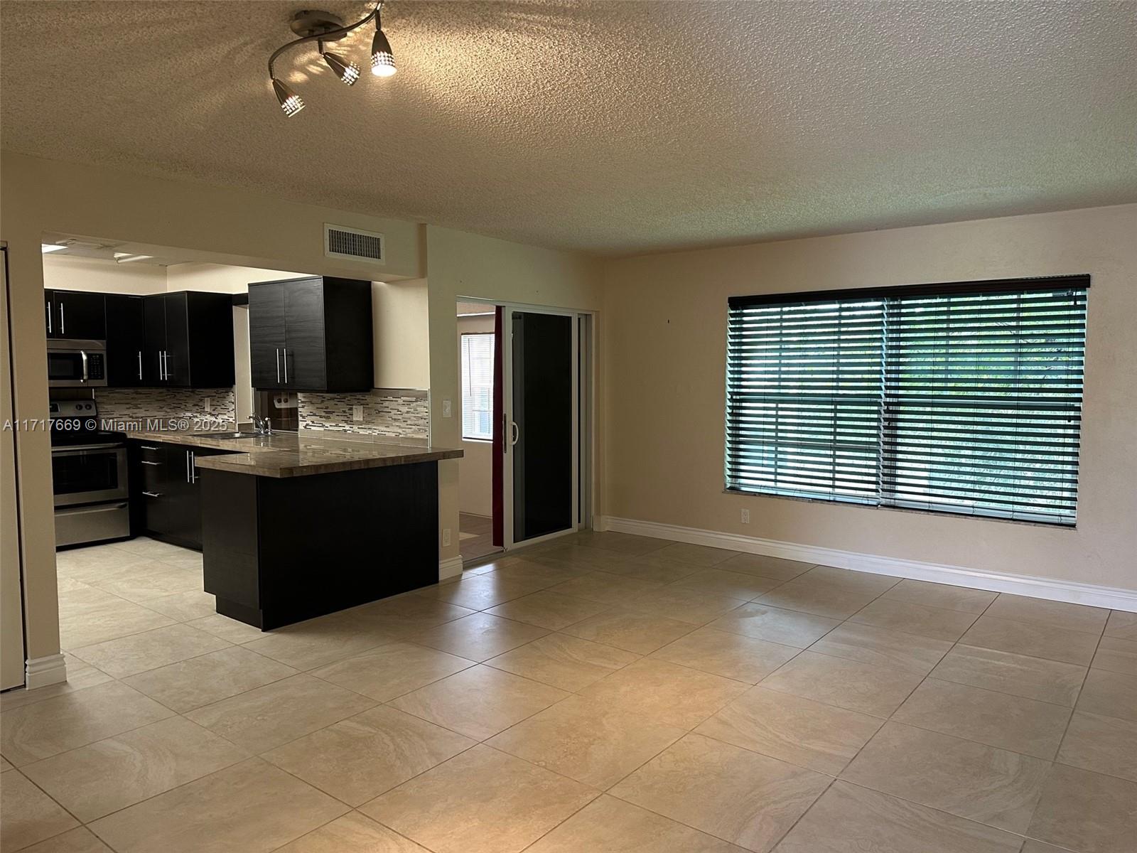 WOOD HUE II CONDO - Residential Lease